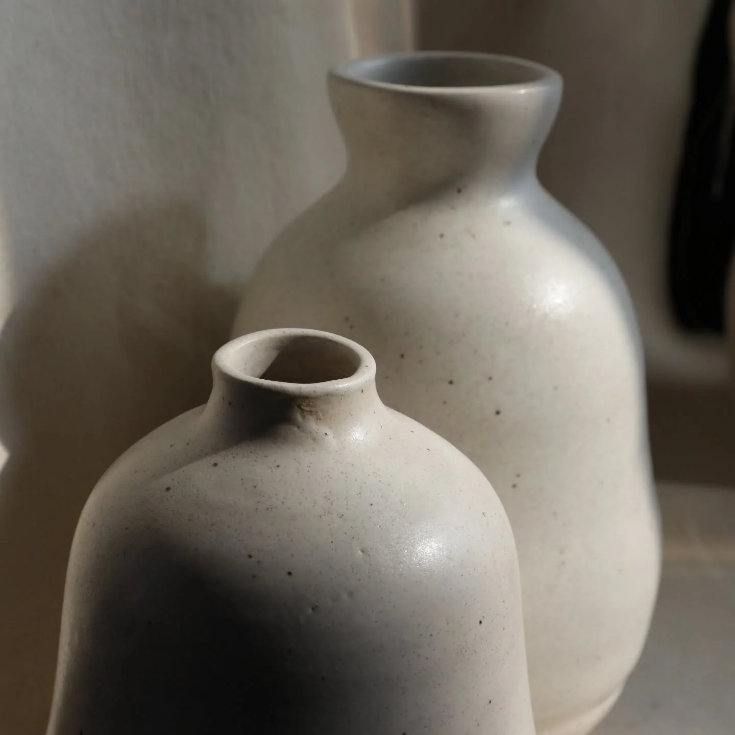 I love the gentle curves of these vases. The small little opening on the small vase always draws my eye and I realized that I enjoy making tiny holes on those vases more so than a wide, flared lip. They are more visually pleasing to me, but what do y