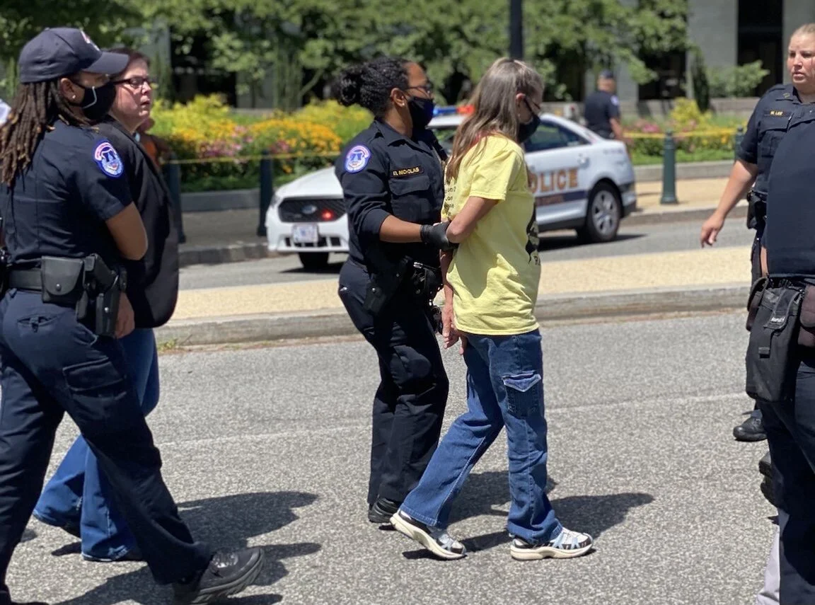 Pam Garrison from the West Virginia Poor People’s Campaign arrested &nbsp;  (photo by Yolanda Barksdale / Repairers of the Breach)