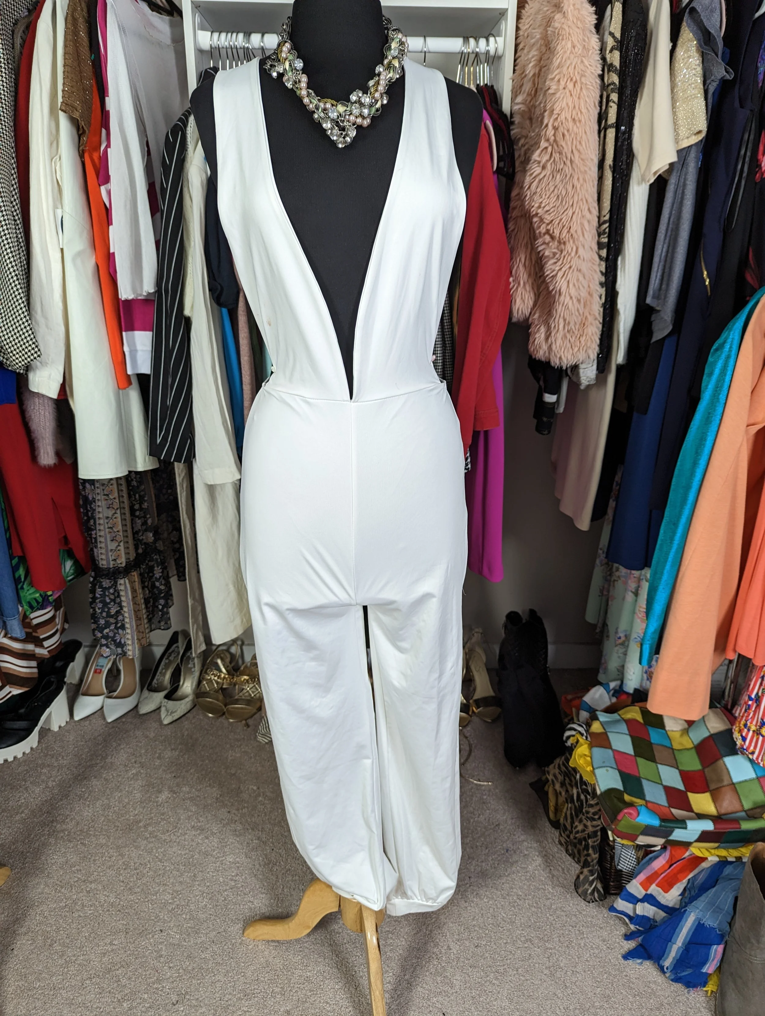 White halter tie jumpsuit with leg slits size Medium