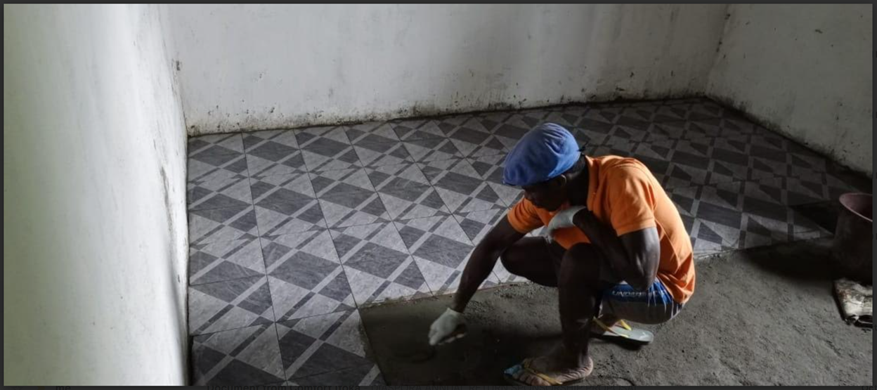 Laying floor tiles