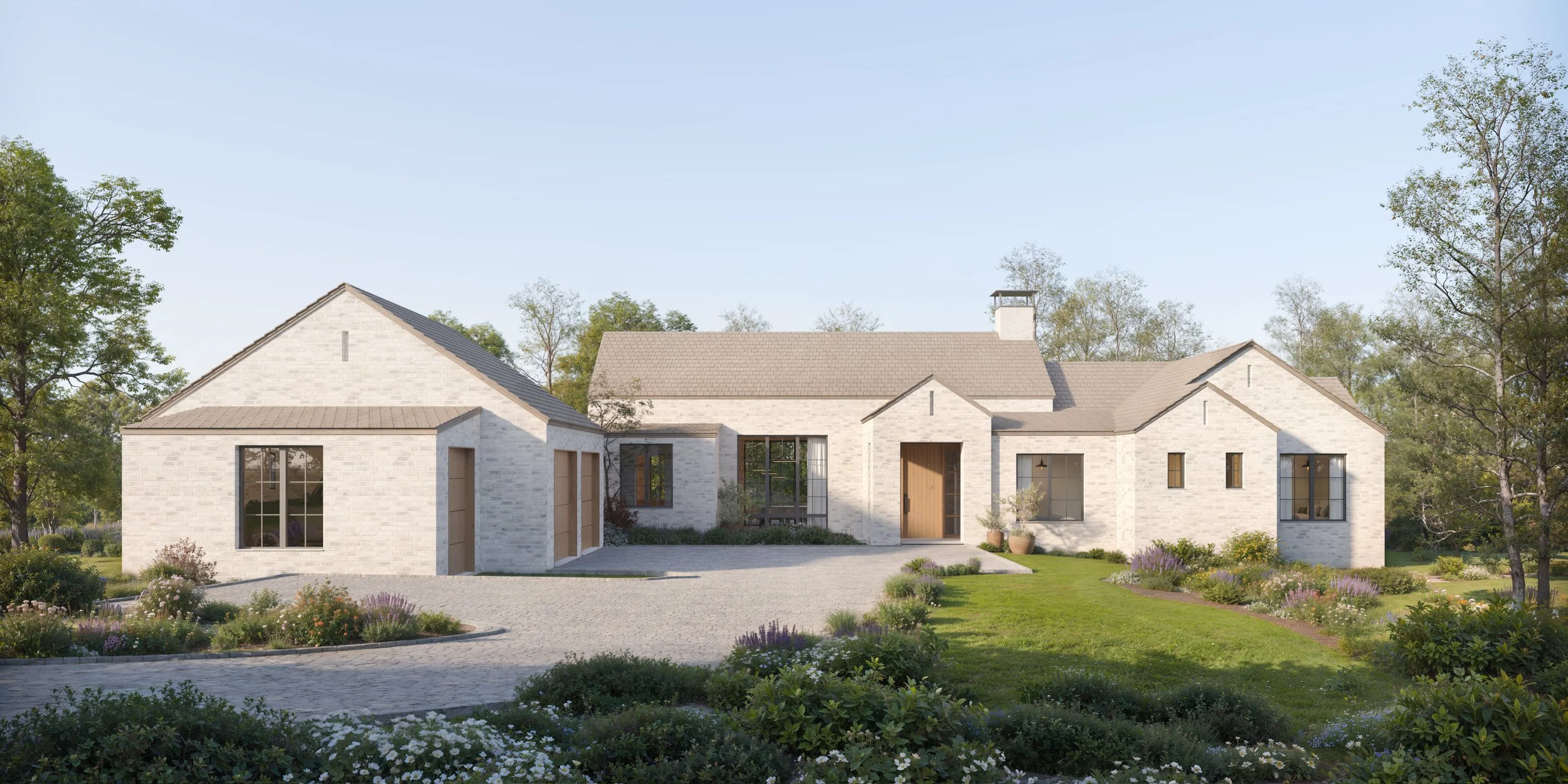 A modern white brick house with multiple gabled roofs, large windows, a front porch, and surrounded by landscaped gardens and trees.