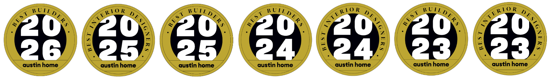 Two gold-colored circular badges with black centers, each displaying the year '2023' with the phrase 'Best Interior Designers' around the edge. The bottom of the badges has the text 'austin home'.