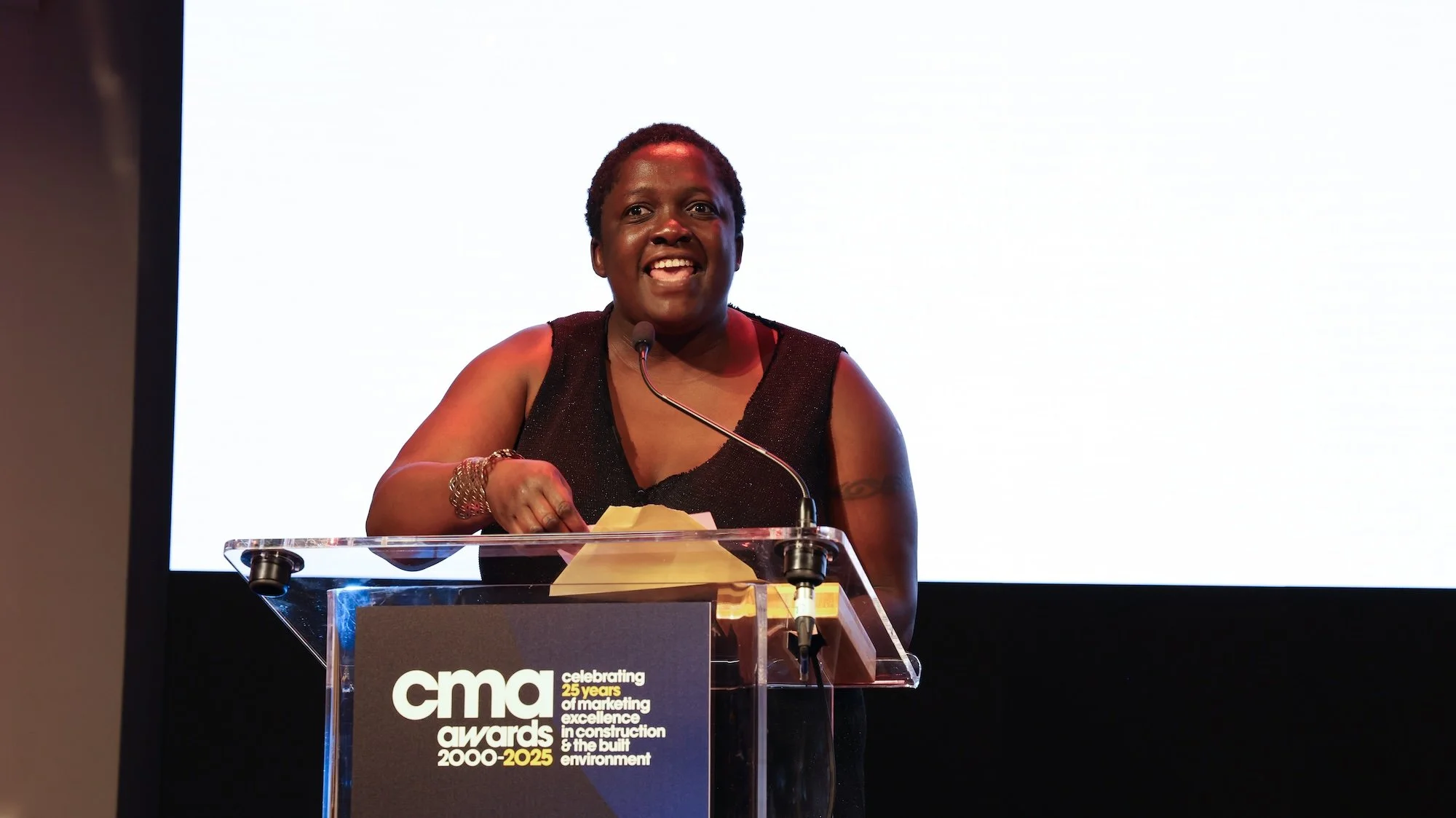 Ayo Abbas presenting an award at the Construction Marketing Awards