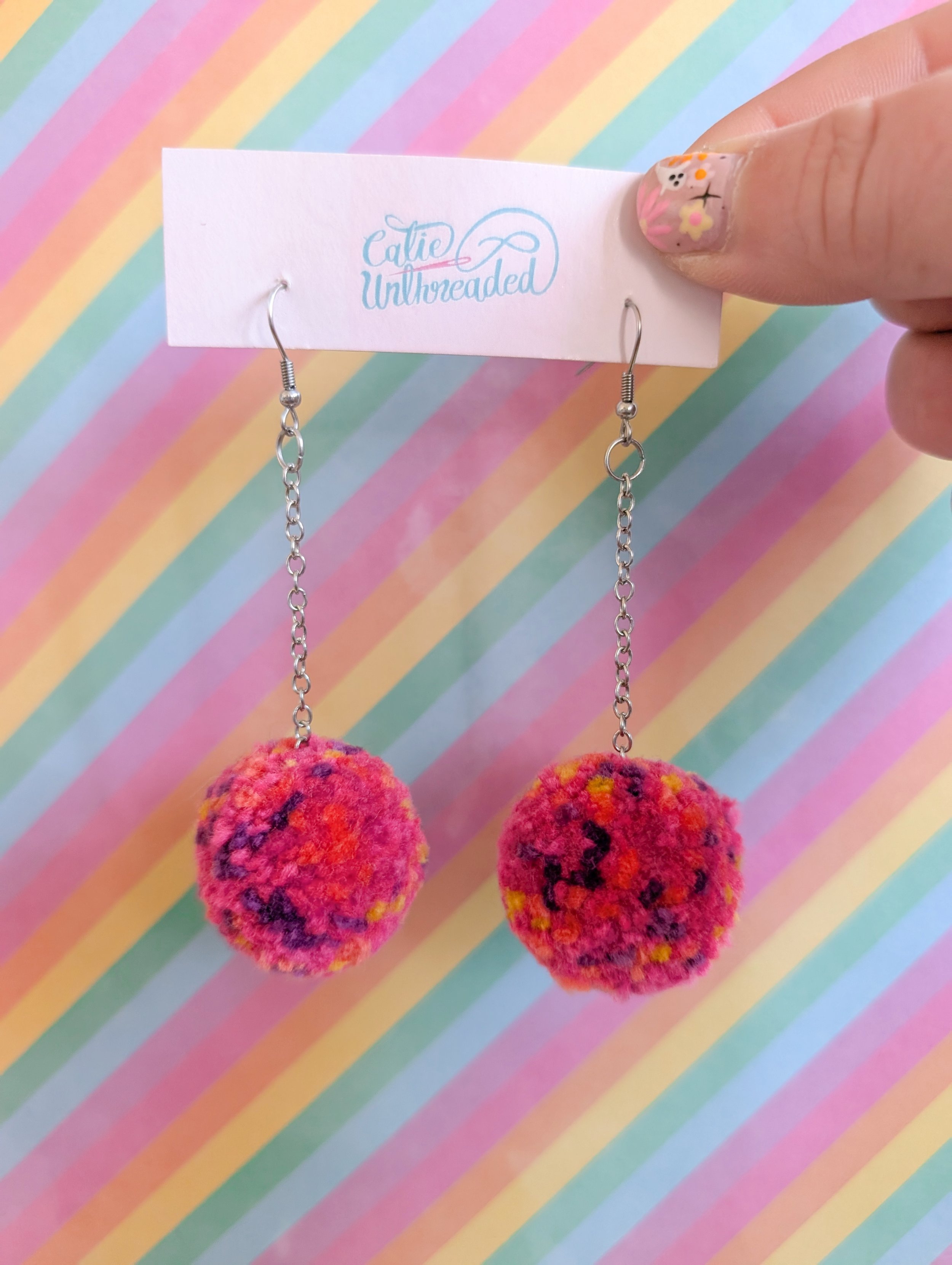 magenta pink yellow pom.jpg