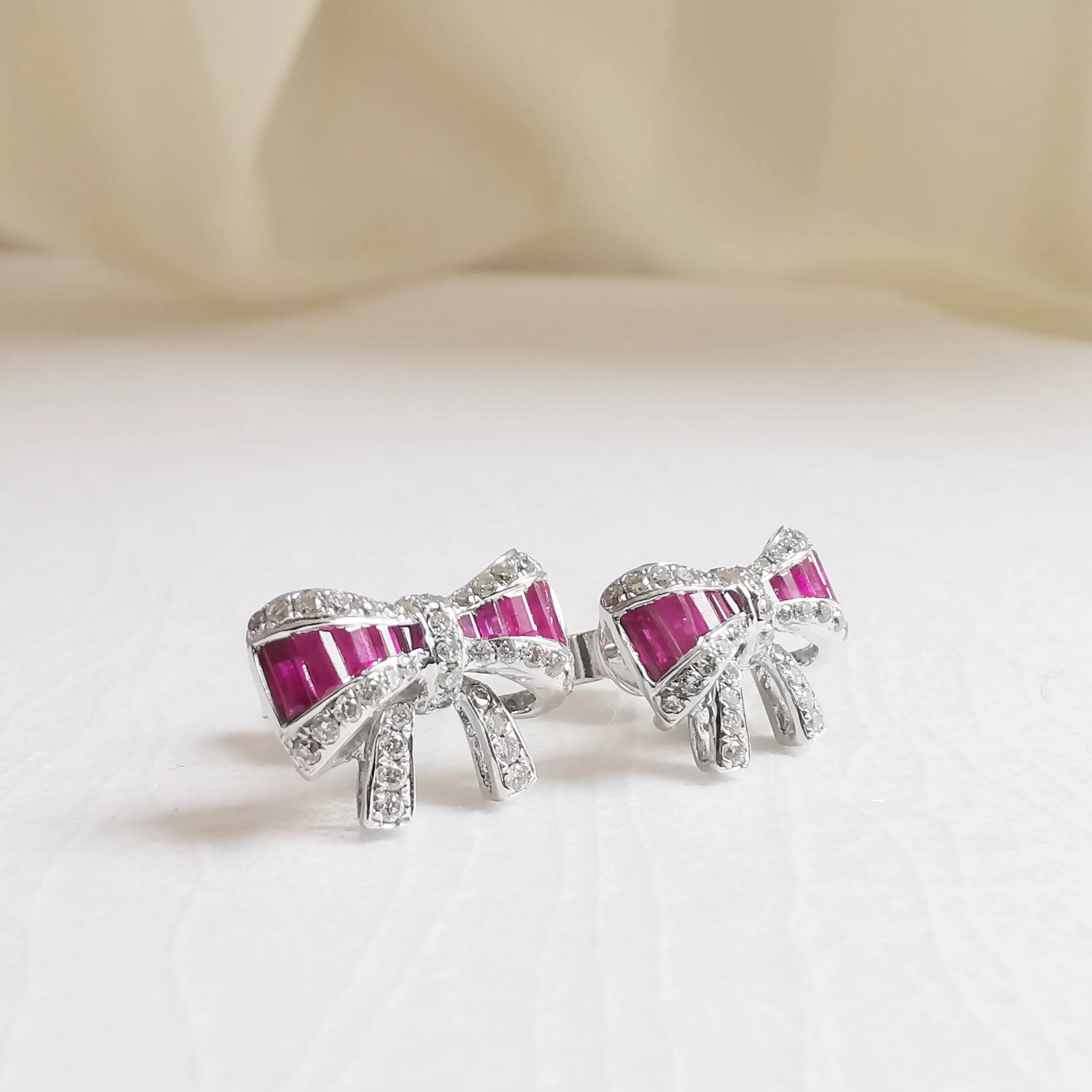 Ruby Ribbon Bow Studs