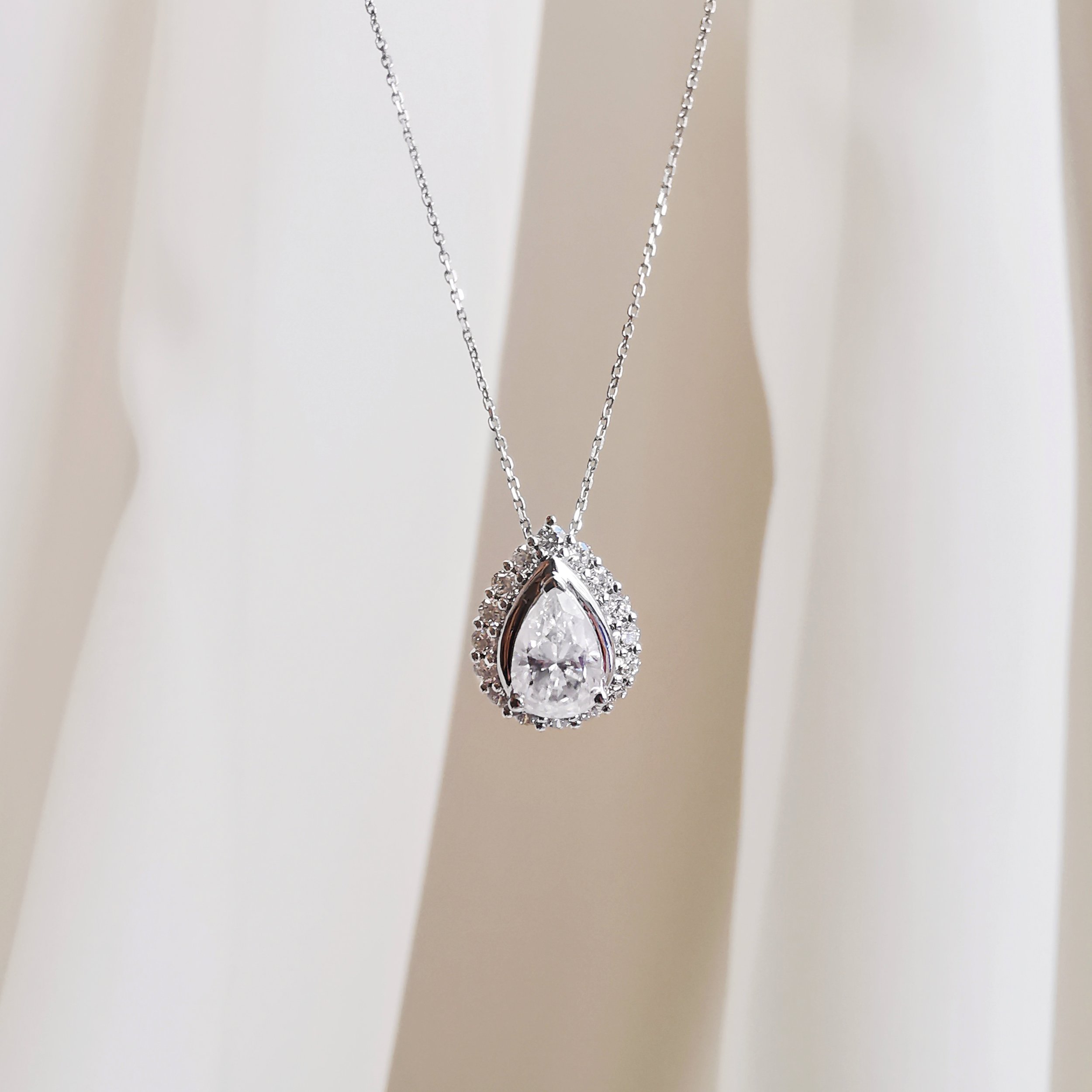 14K Damea Pear Solitaire Moissanite Pendant 8.jpeg