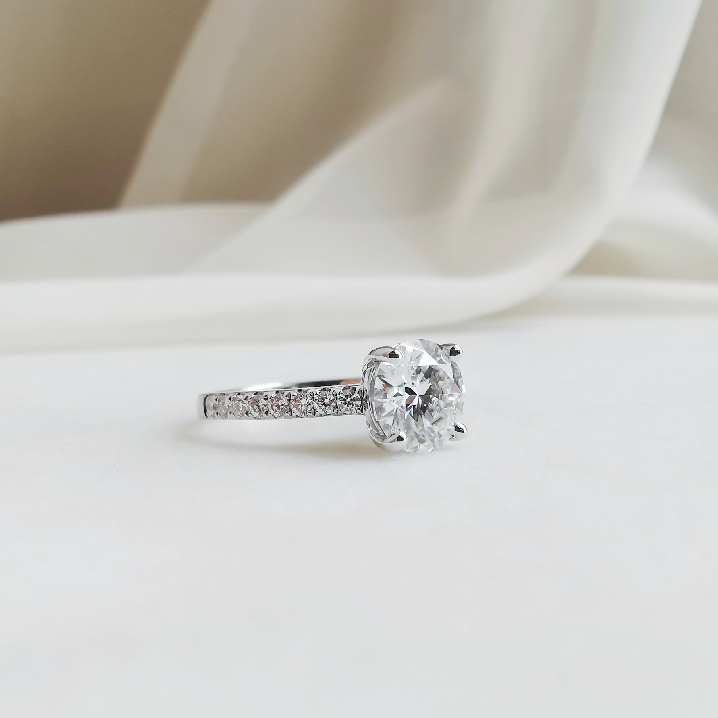 18K Angel’s Cradle Solitaire Moissanite Ring 2.jpeg