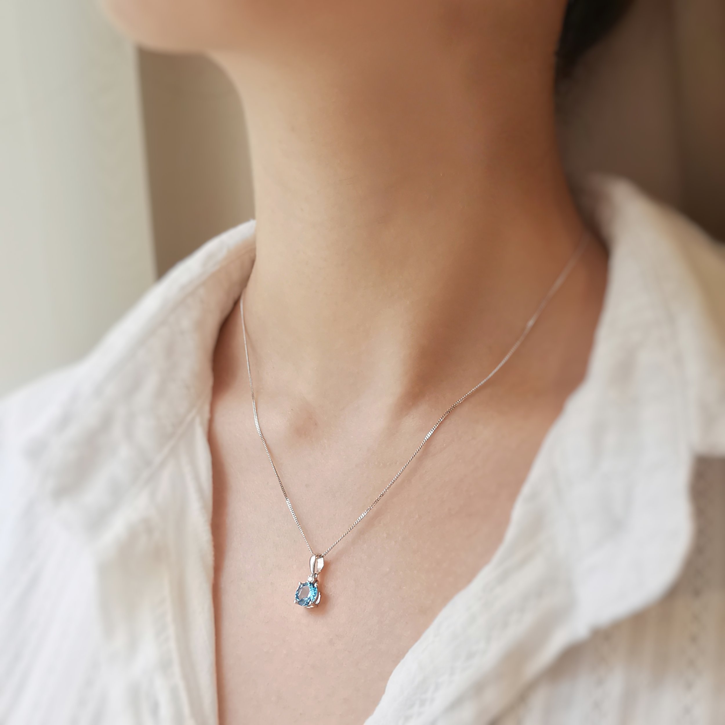 18K Maidin Round Blue Topaz Solitaire Pendant with Diamond 5.jpeg