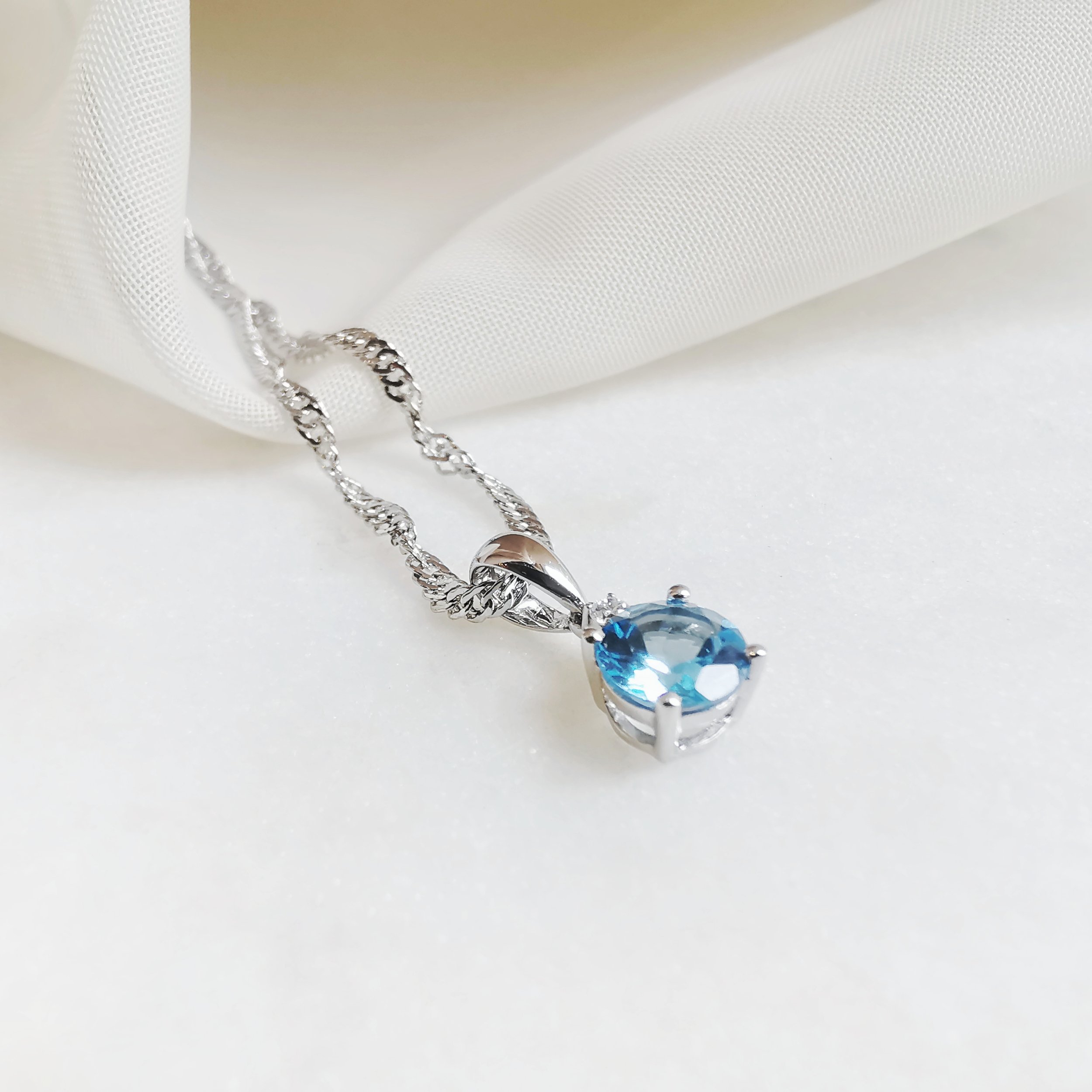 18K Maidin Round Blue Topaz Solitaire Pendant with Diamond 4.jpeg