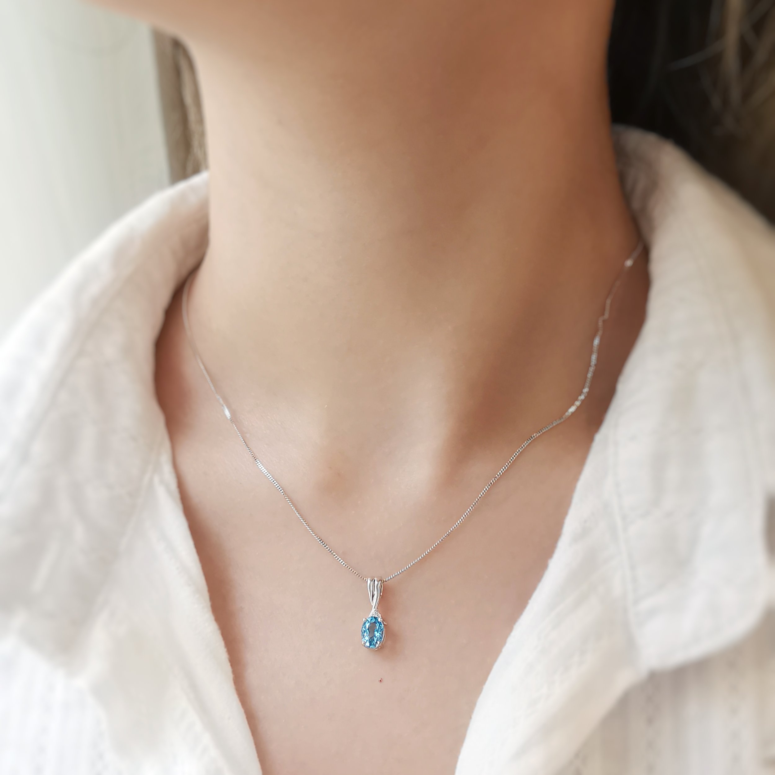 18K Helix Blue Topaz Pendant with Diamond 5.jpeg
