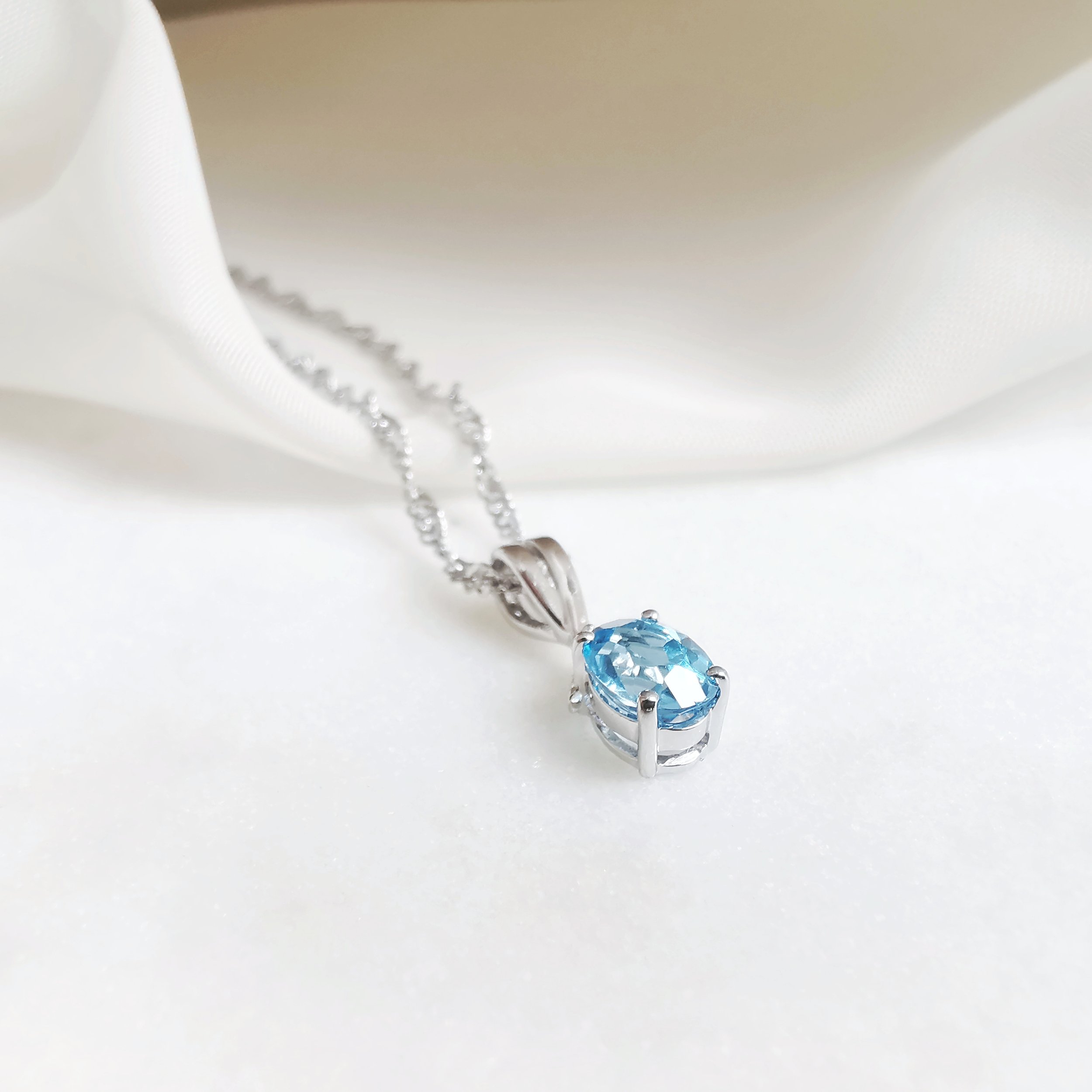 18K Helix Blue Topaz Pendant with Diamond 2.jpeg