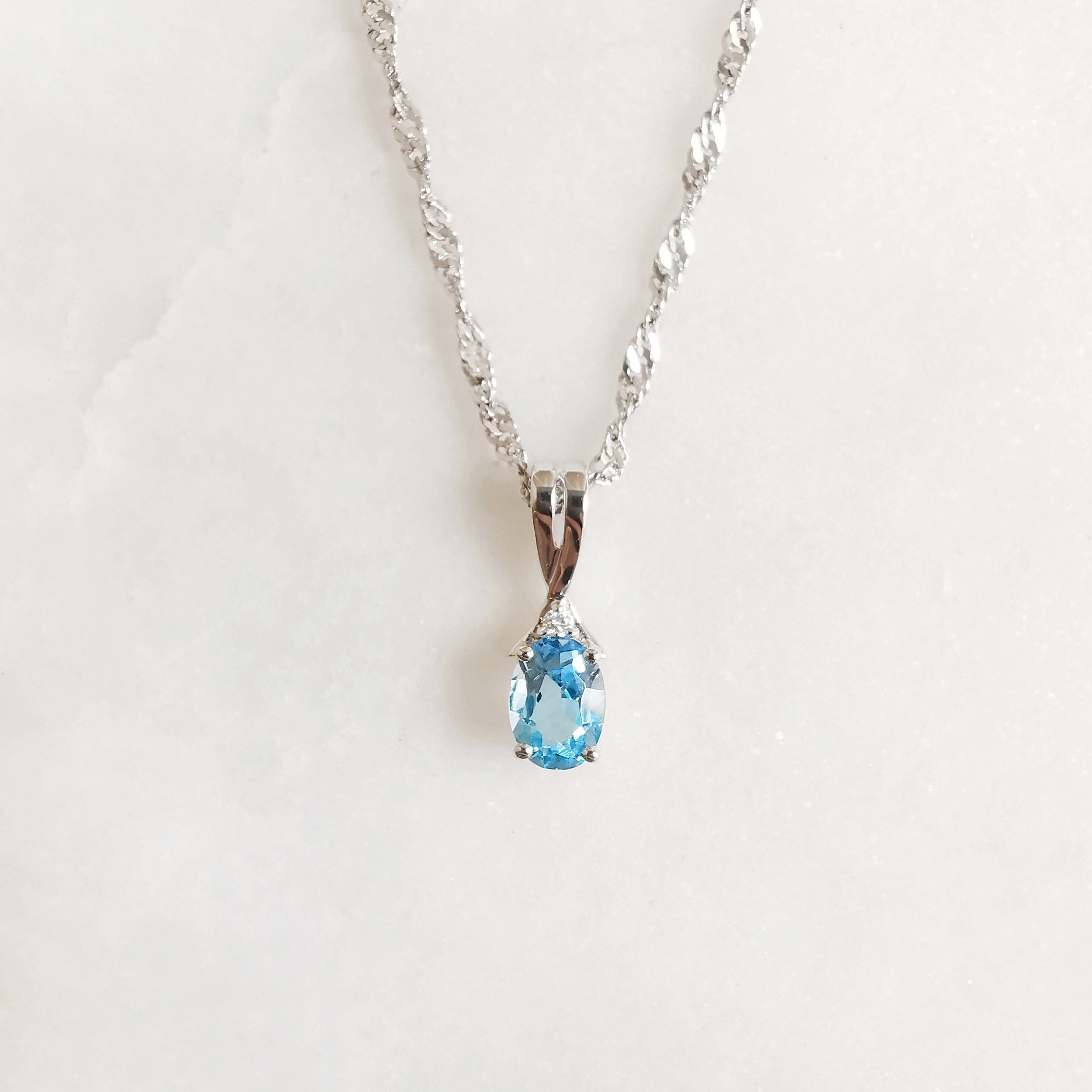 18K Helix Blue Topaz Pendant with Diamond 1.jpeg