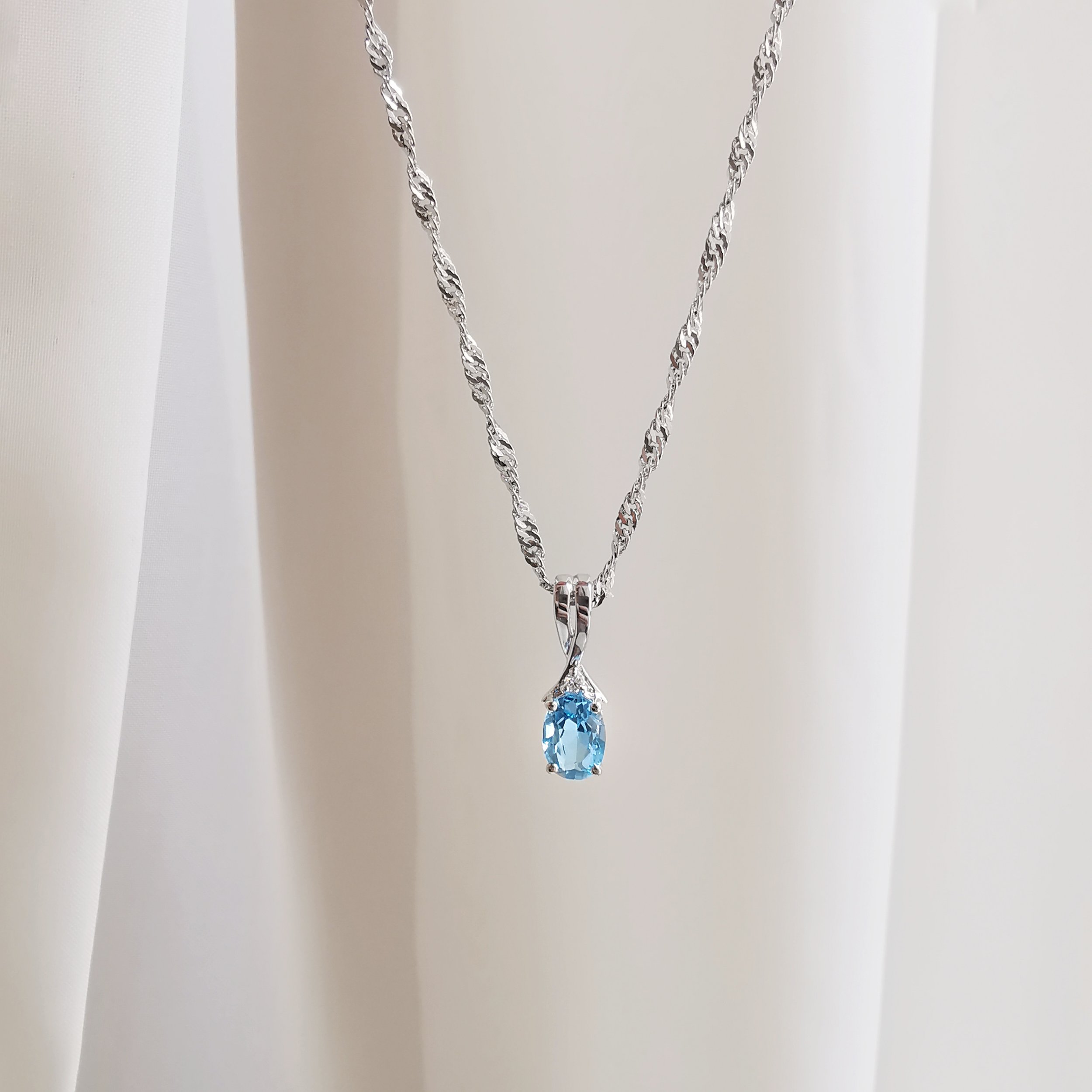 18K Helix Blue Topaz Pendant with Diamond 4.jpeg