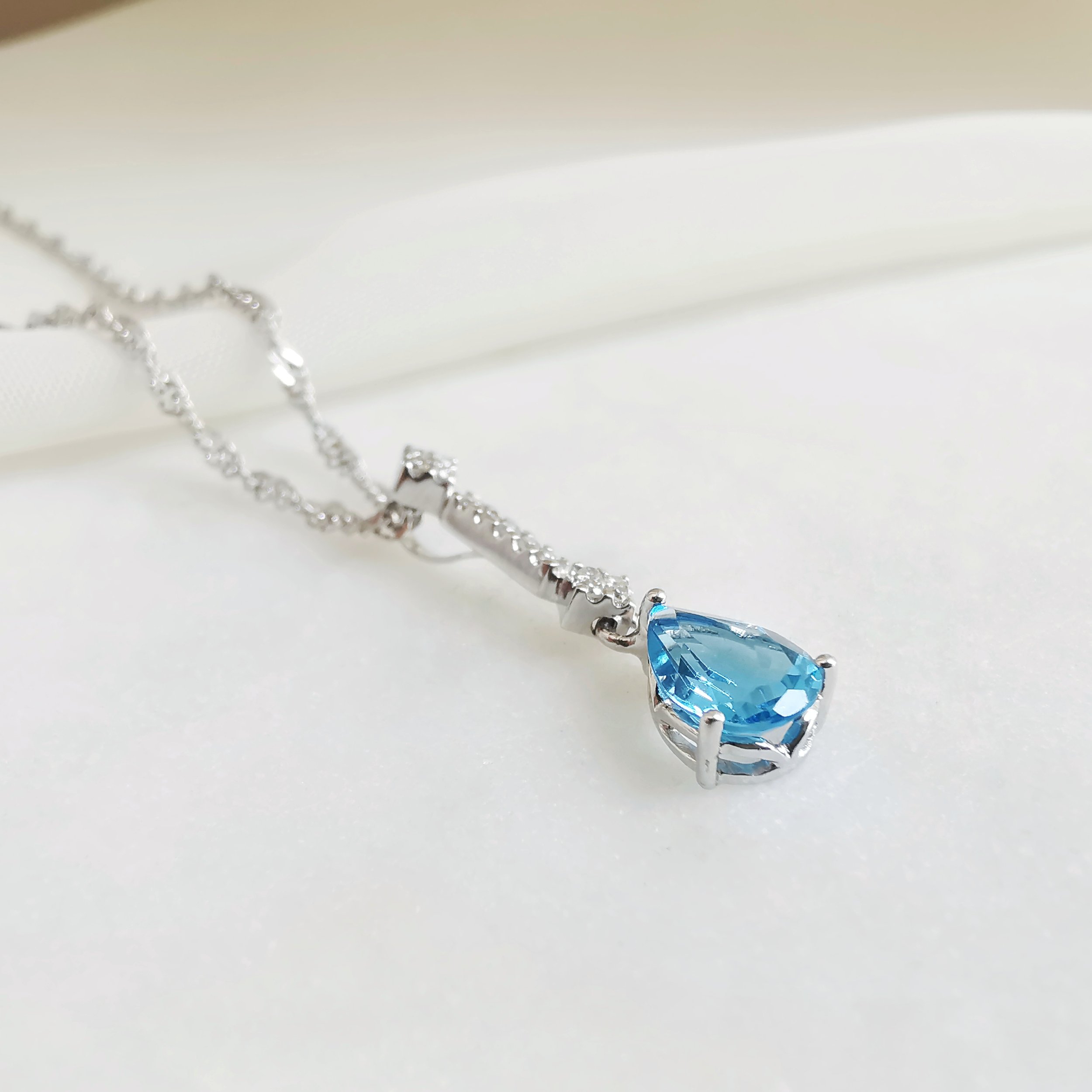18K Yuliang Blue Topaz Pendant with Diamond 4.jpeg