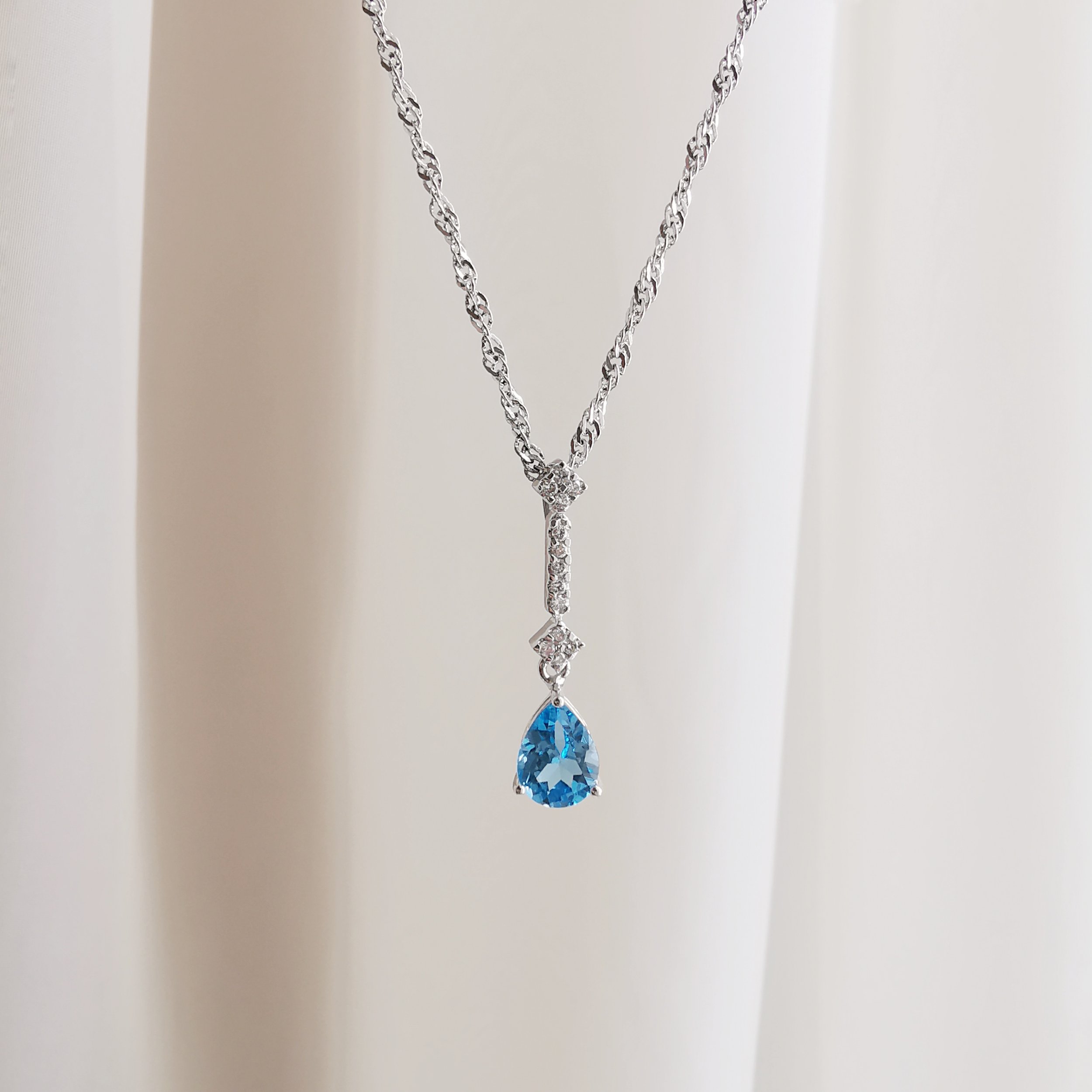 18K Yuliang Blue Topaz Pendant with Diamond 3.jpeg