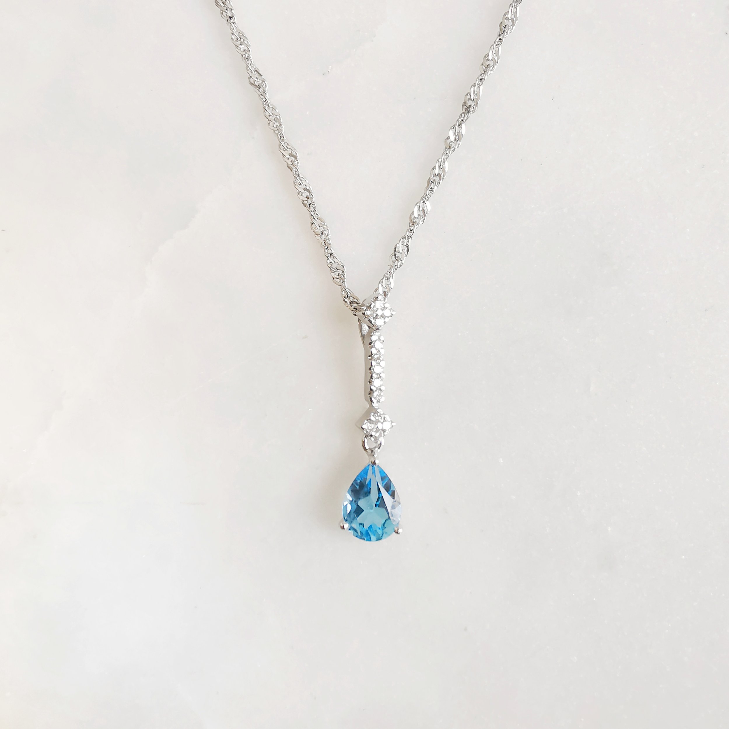 18K Yuliang Blue Topaz Pendant with Diamond 1.jpeg