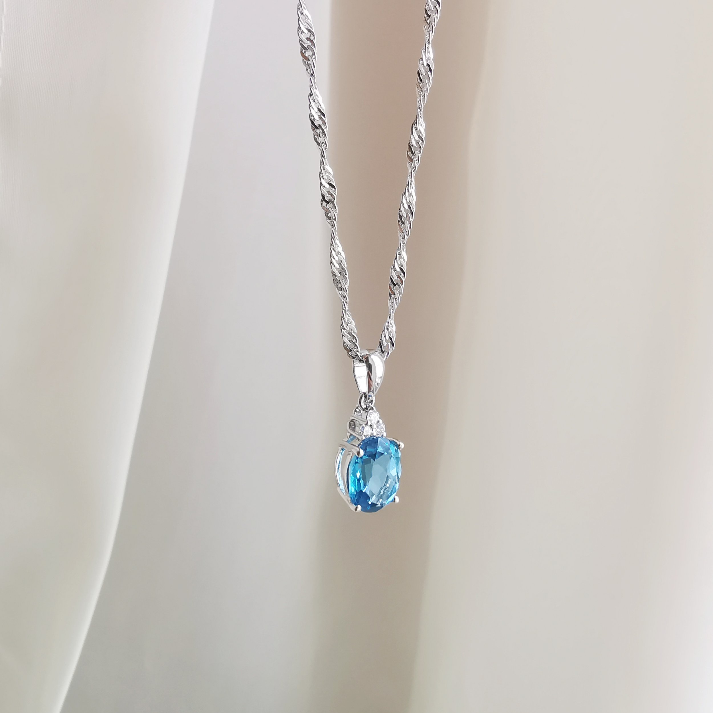 18K Bella Blue Topaz Pendant with Diamond 3.jpeg