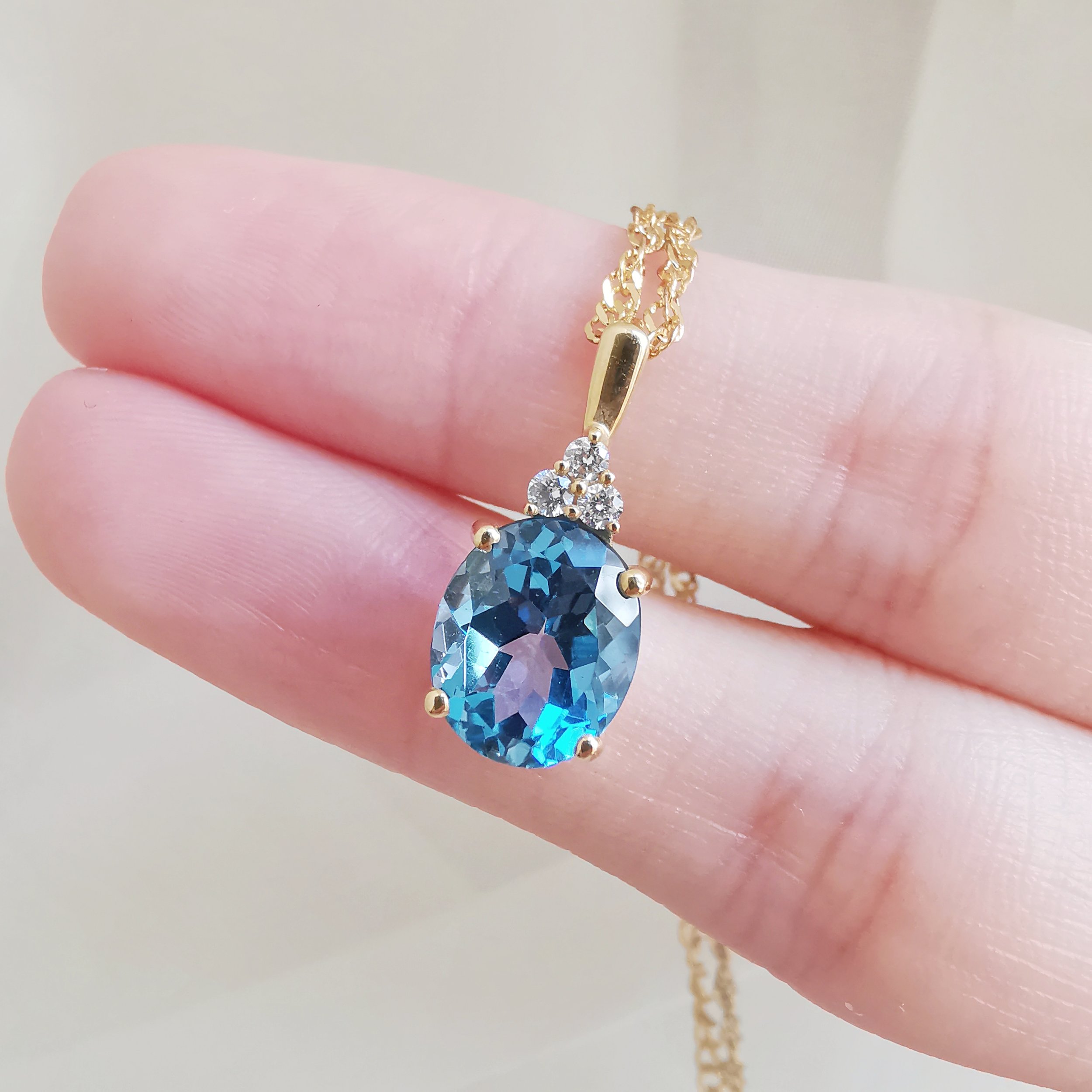 18K Trois Blue Topaz Pendant with Diamond 2.jpeg