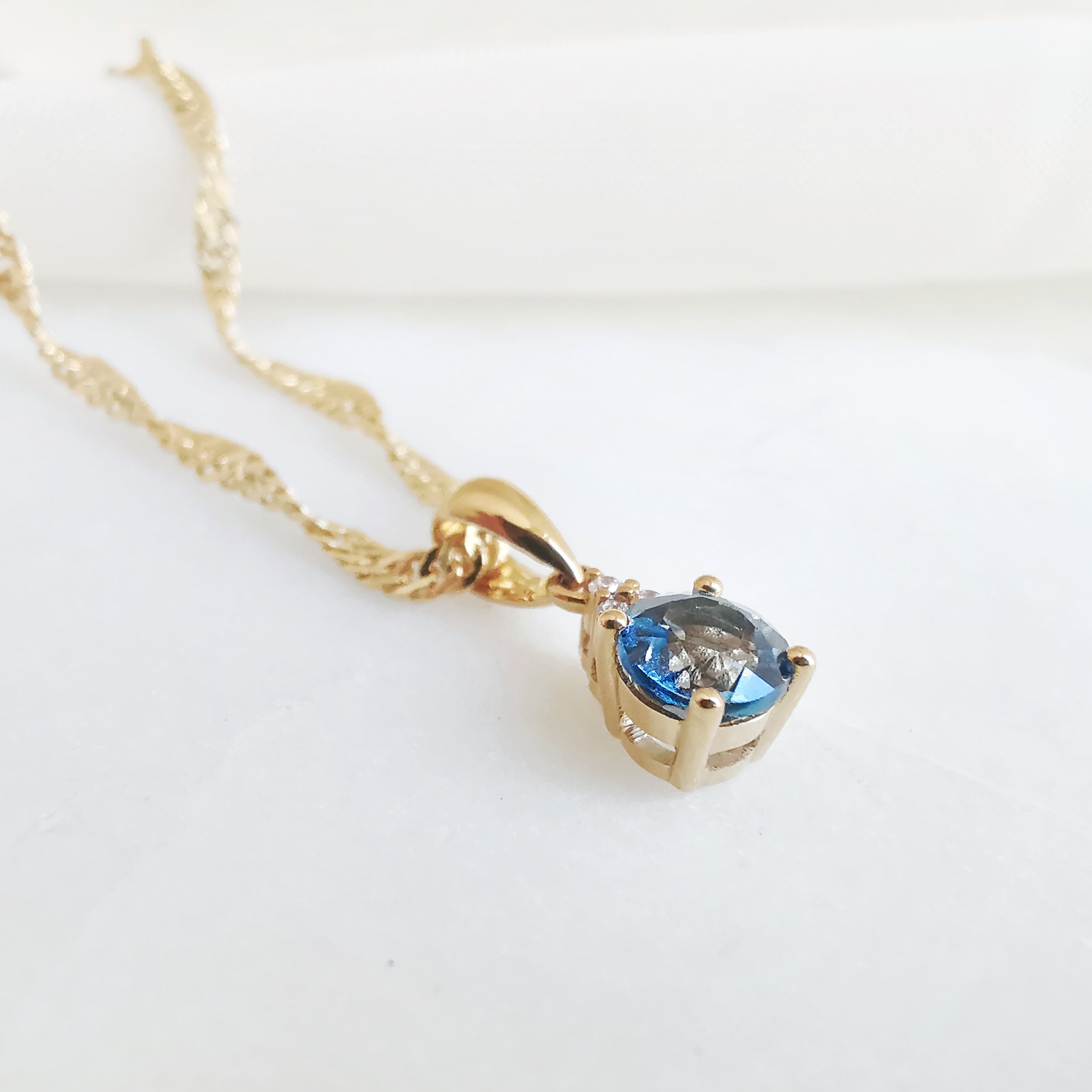 18K Chronos Blue Topaz Pendant with Diamond 2.jpeg