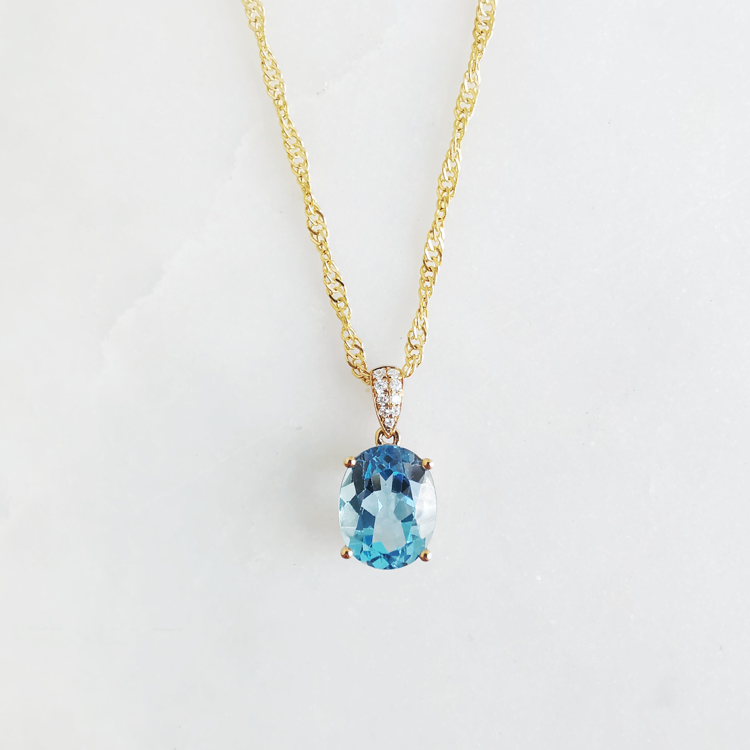 18K Fleuve Blue Topaz Pendant with Diamond 1.jpeg