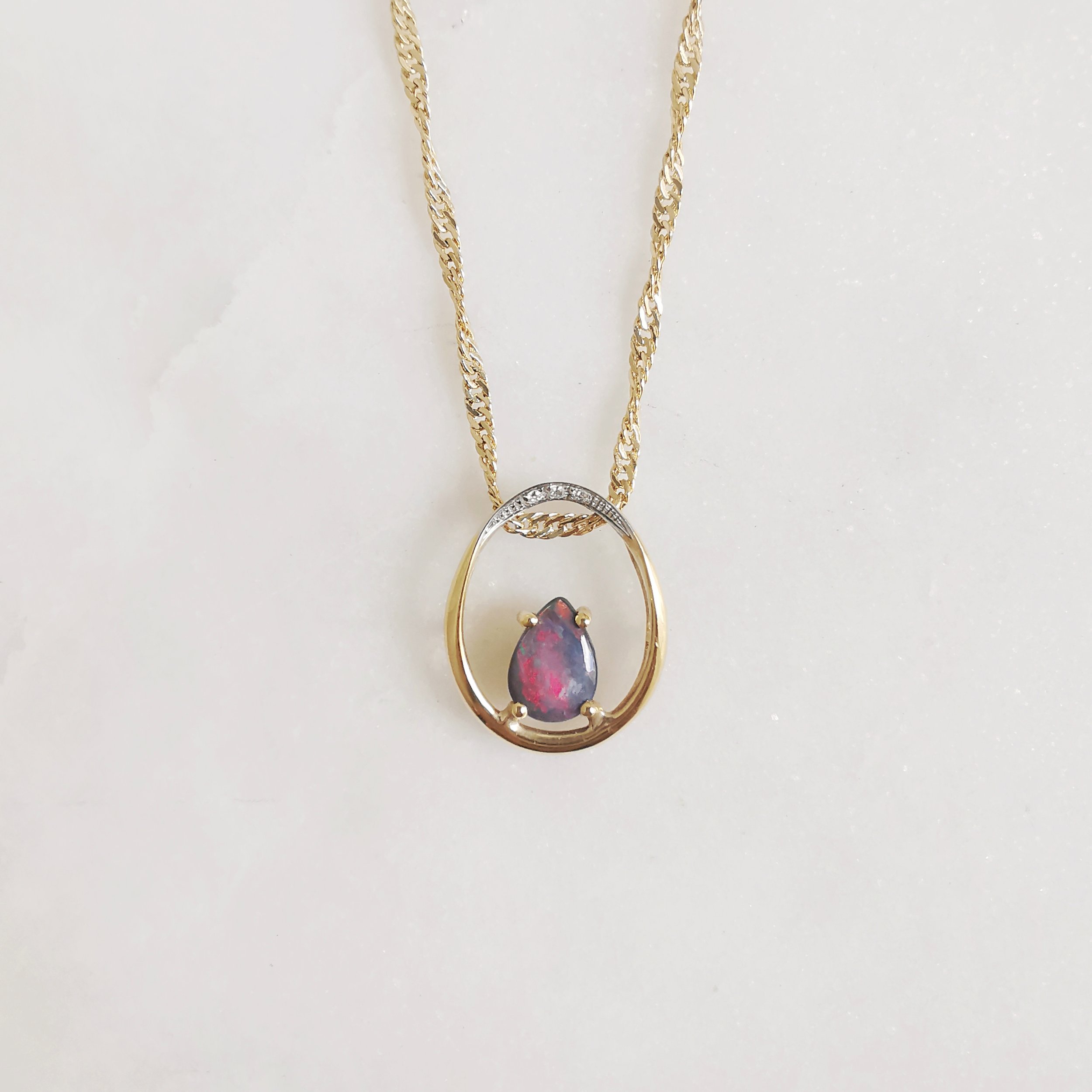 18K Dragon’s Egg Australian Black Opal and Diamond Pendant 1.jpeg