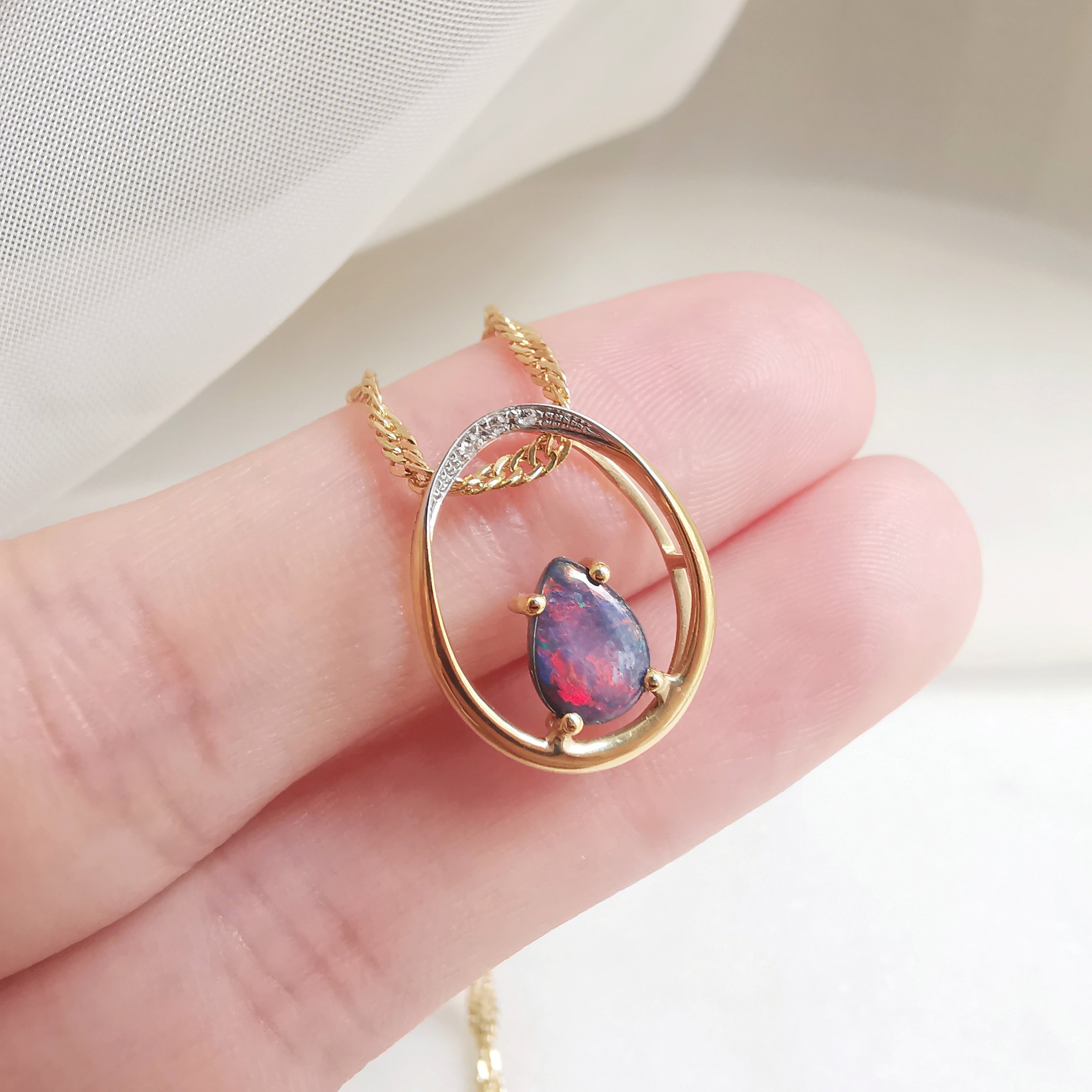 18K Dragon’s Egg Australian Black Opal and Diamond Pendant 5.jpeg
