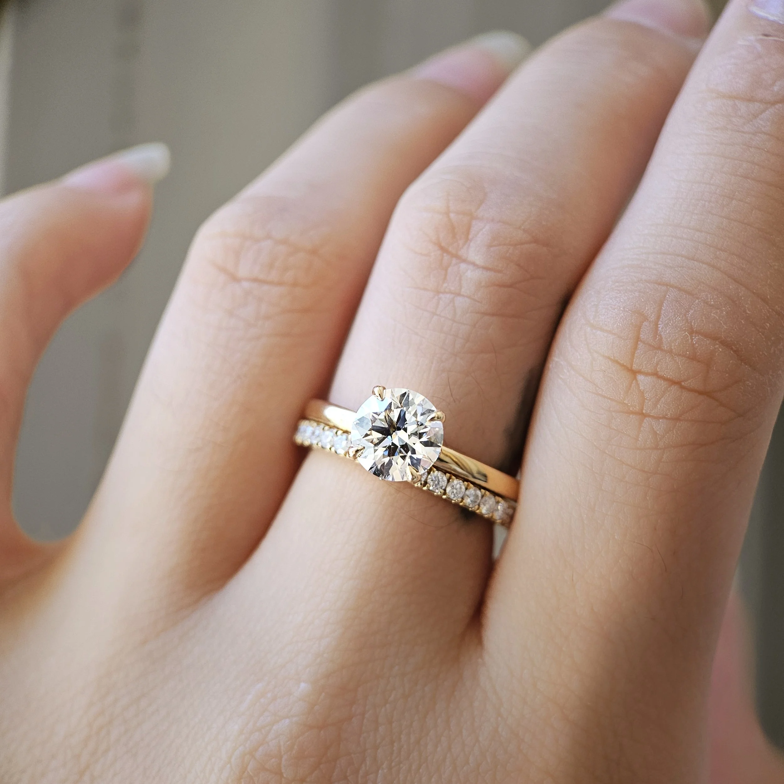 IGI775631866-The Lotus Round Diamond Ring-08.jpeg
