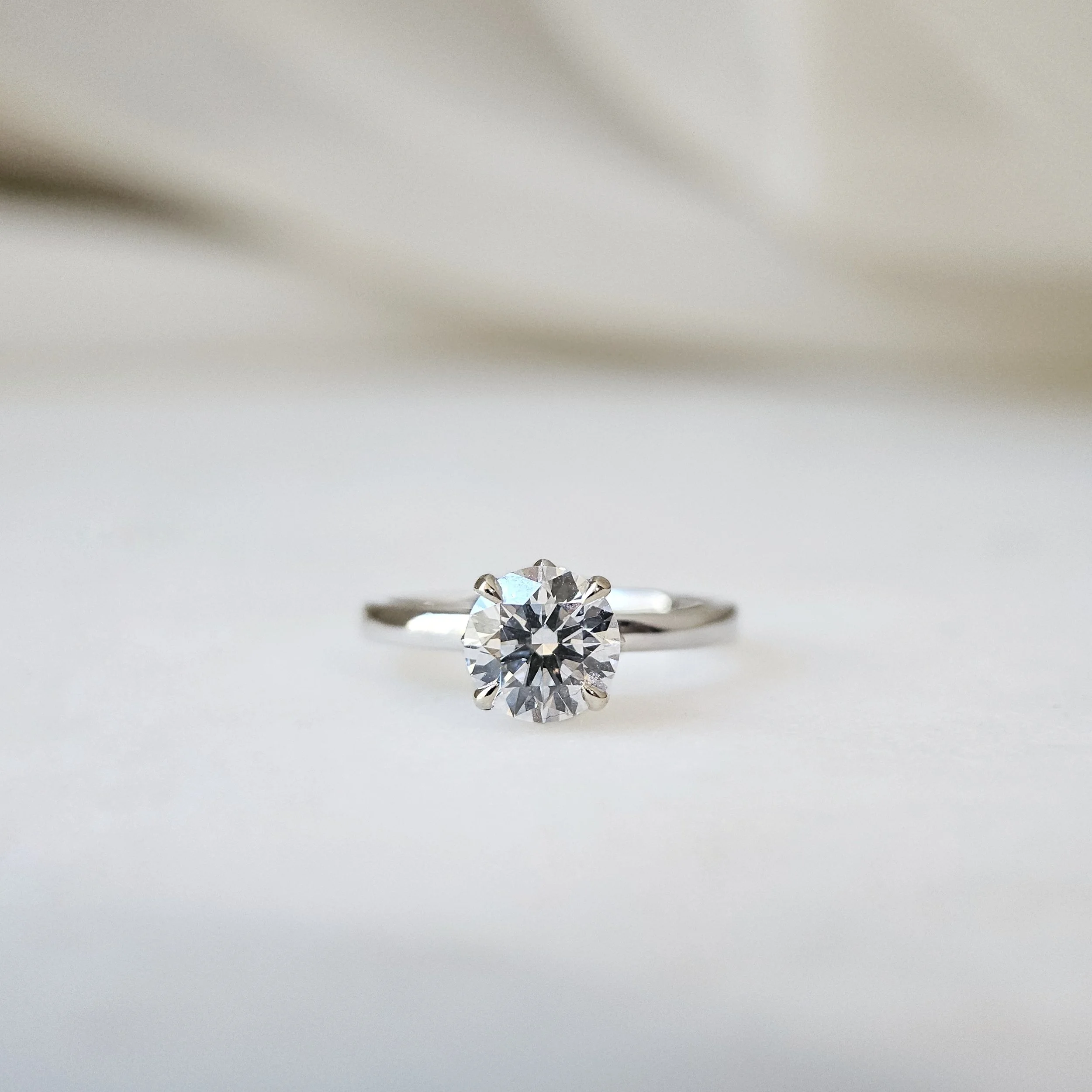 IGI775631866-The Lotus Round Diamond Ring-01.jpeg