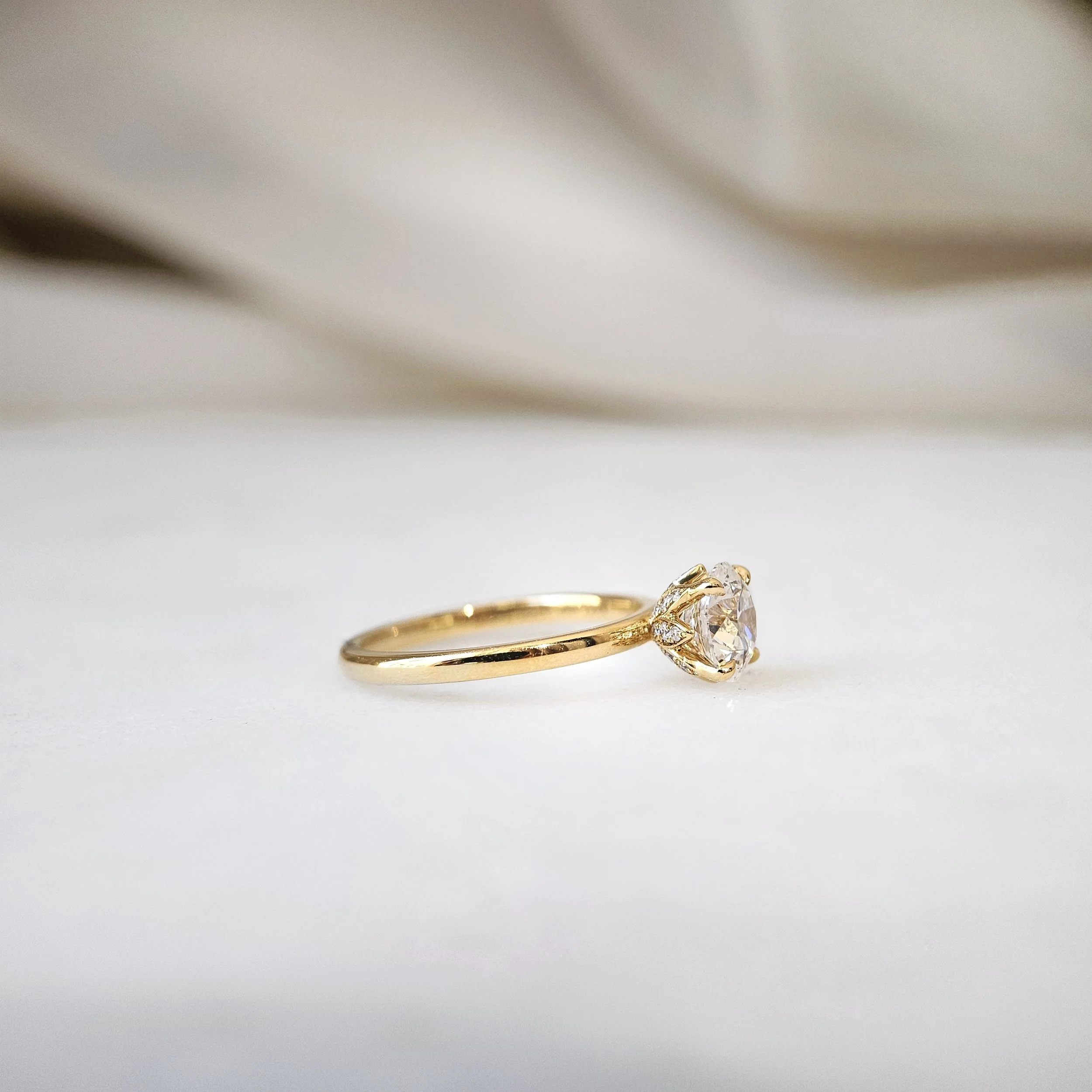 IGI775631866-The Lotus Round Diamond Ring-10.jpeg