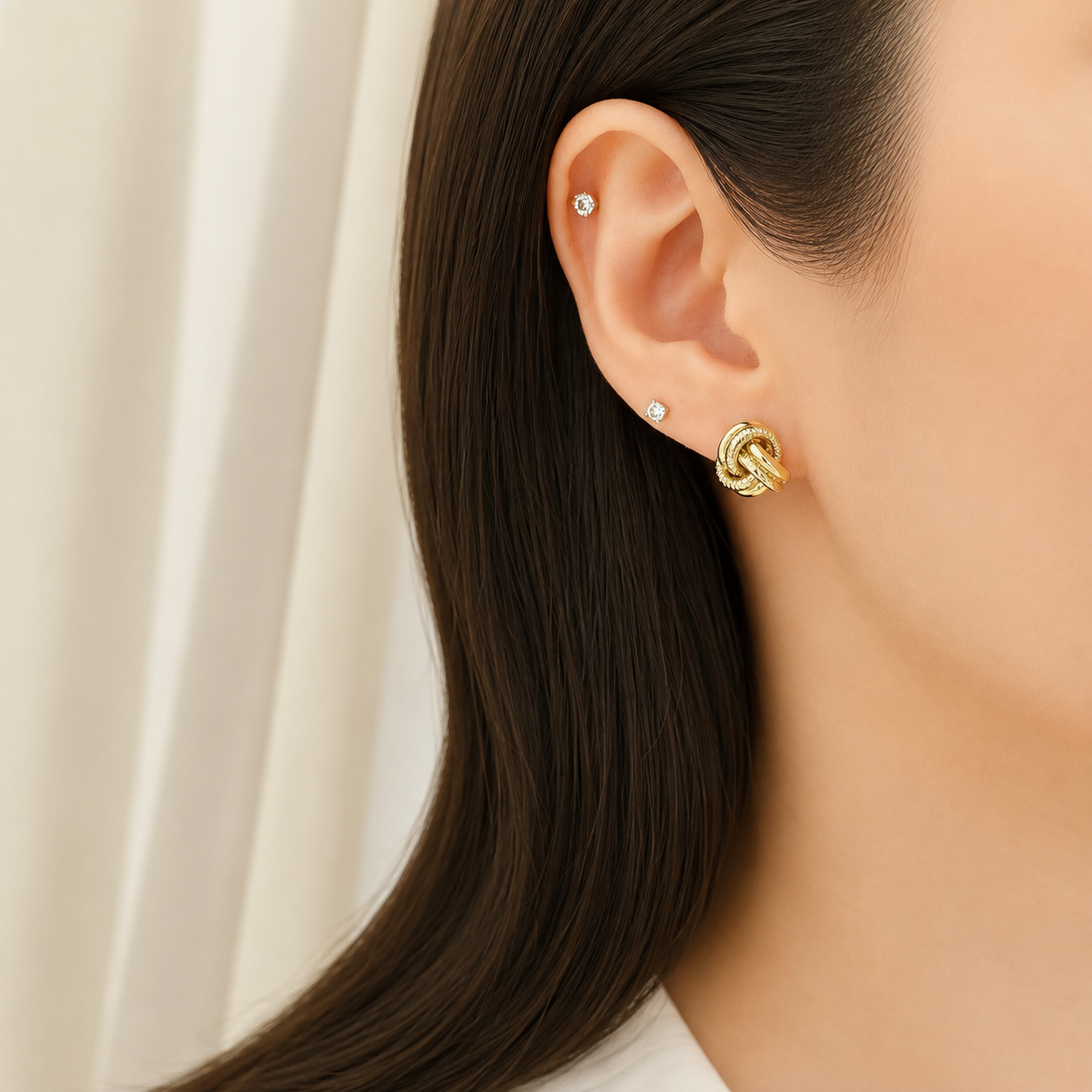 18EKNTI071001*12-TWISTED-KNOT-STUD-EARRINGS-03.png