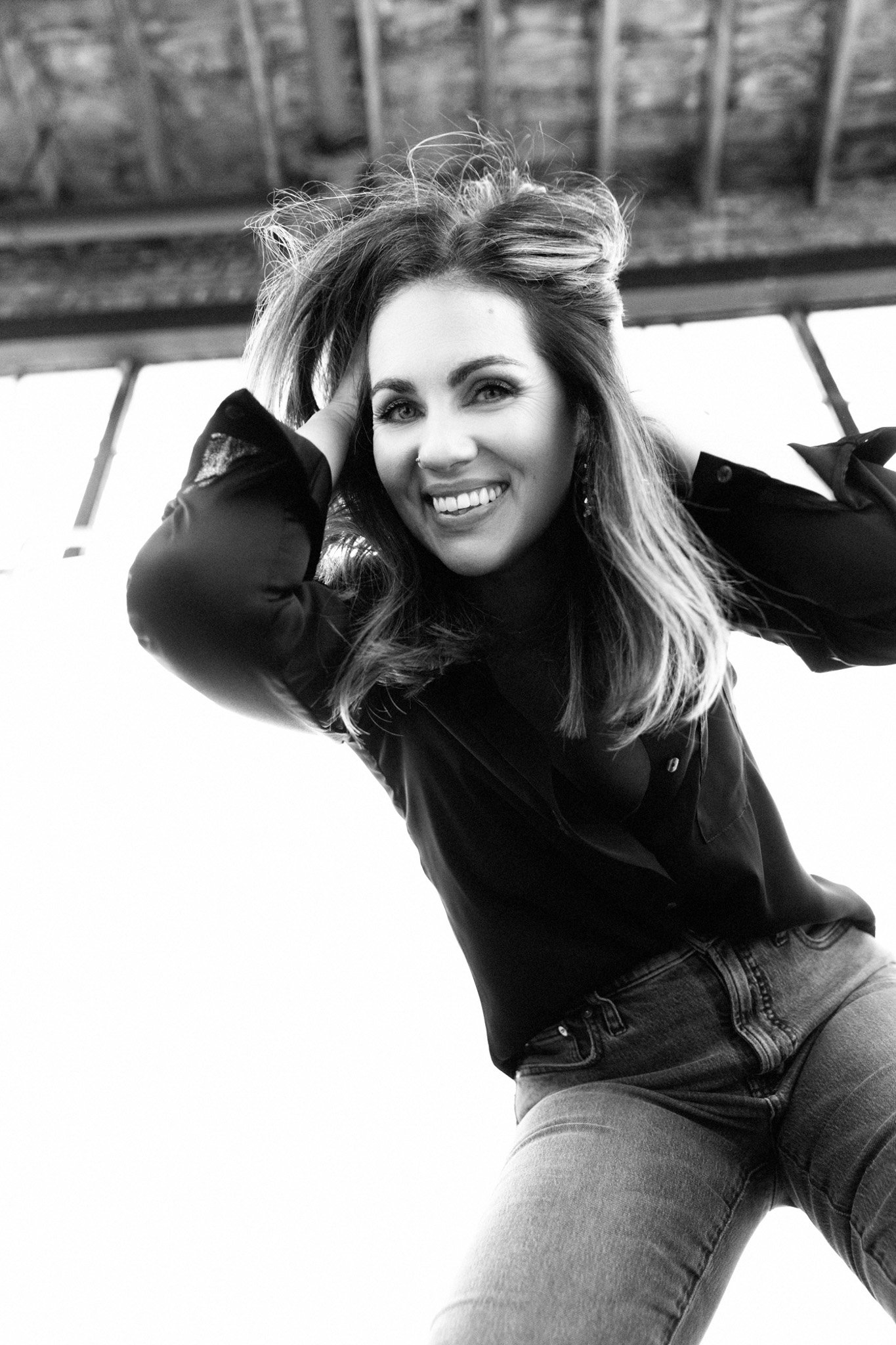 Black and white Nashville branding portrait full of joy and movement by Judith Hill Photography