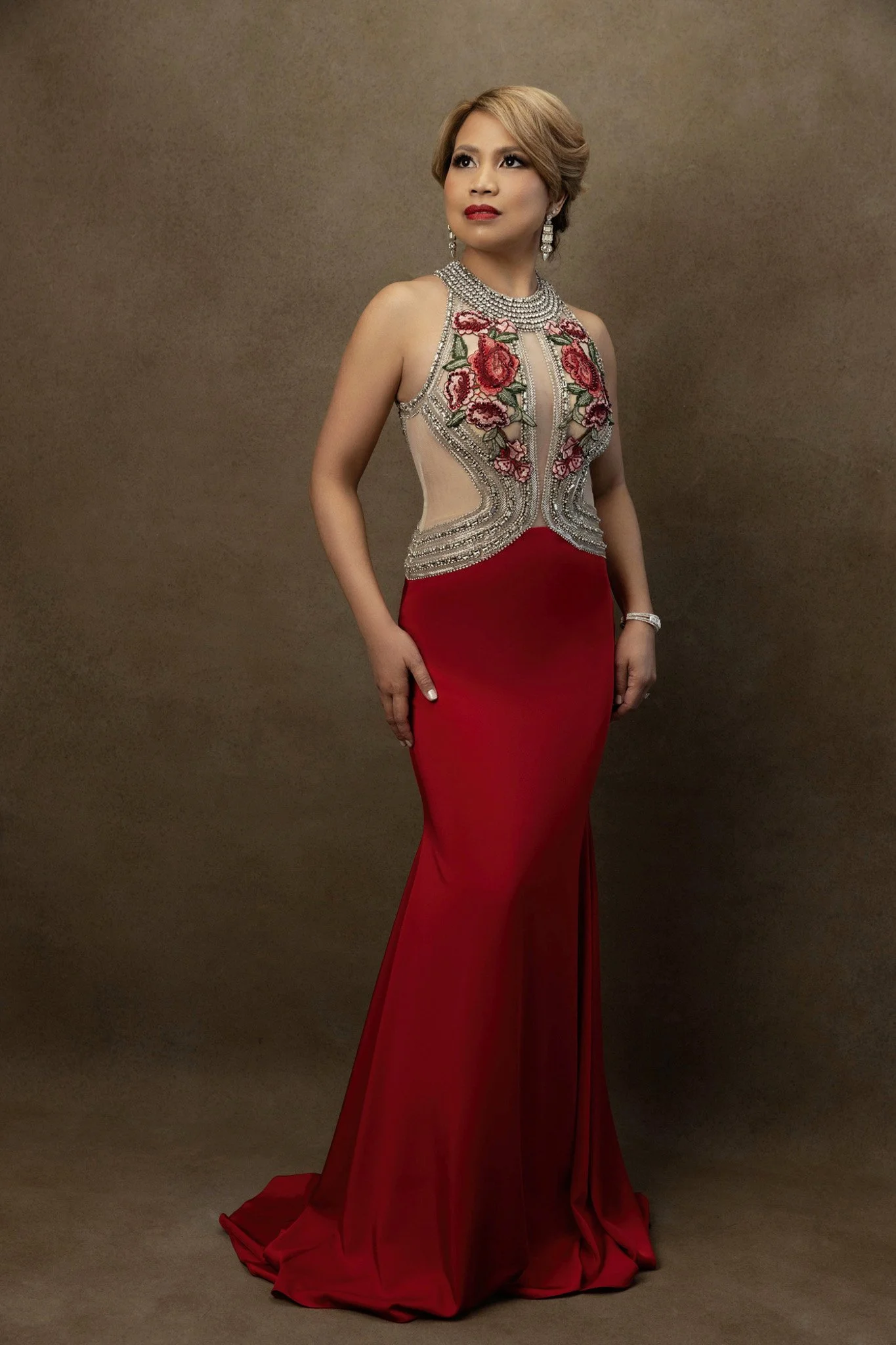 Nashville studio portrait of a woman in a red gown by Judith Hill Photography