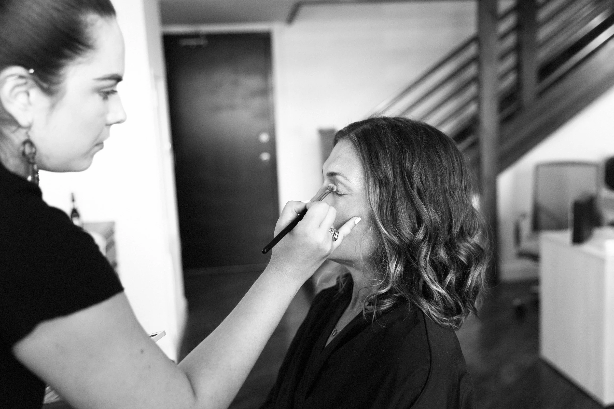 Woman over 40 getting hair and makeup before her photoshoot in Judith Hill's Nashville Portrait Studio.
