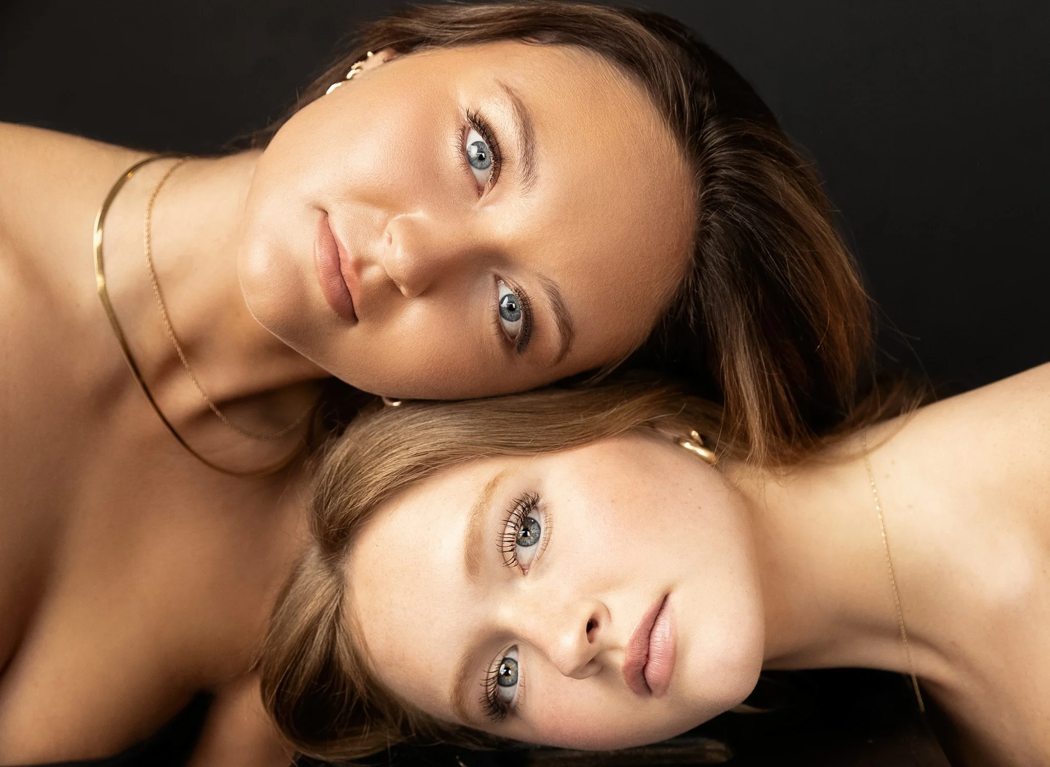 Two young women posed cheek to cheek, Nashville beauty portrait by Judith Hill