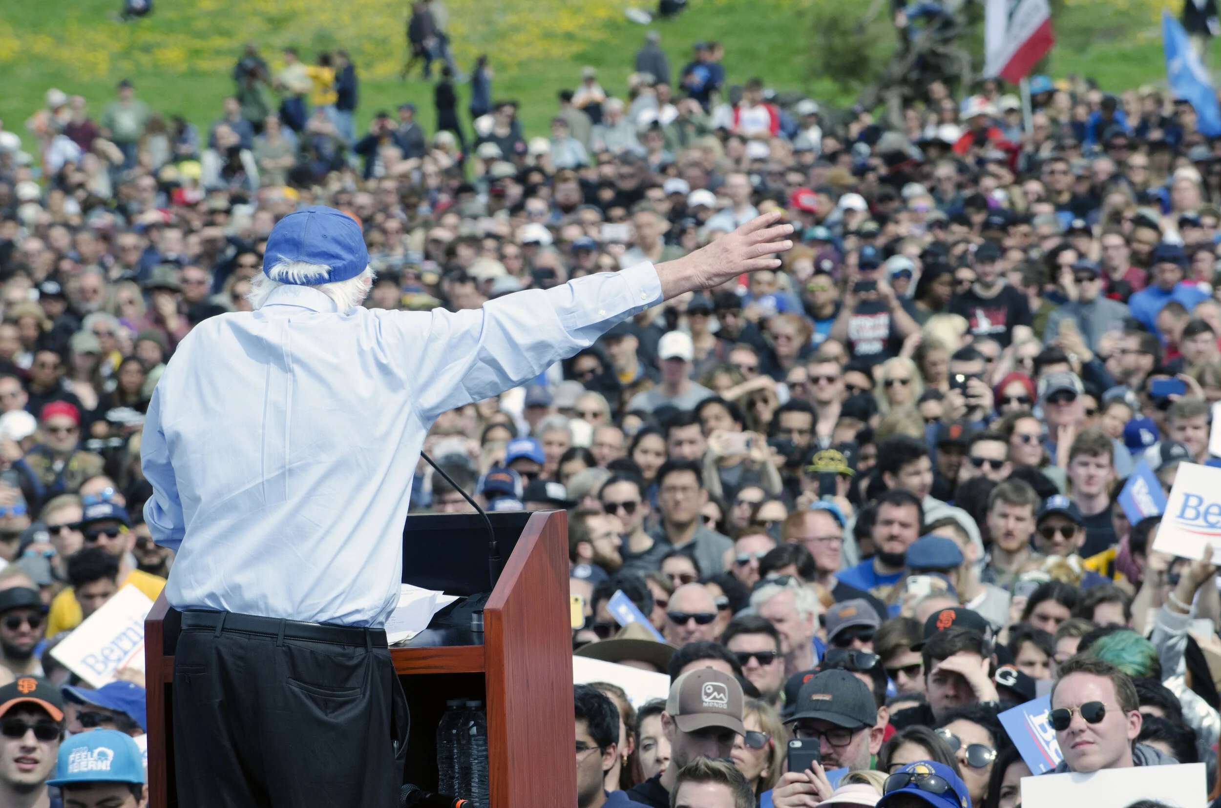Presidential candidate Bernie Sanders reaches out to the crowd mid-speech during a March 24 rally in San Francisco, Calif. The audience numbered over 16,000, according to the Sanders campaign. Photo by Eric Fang