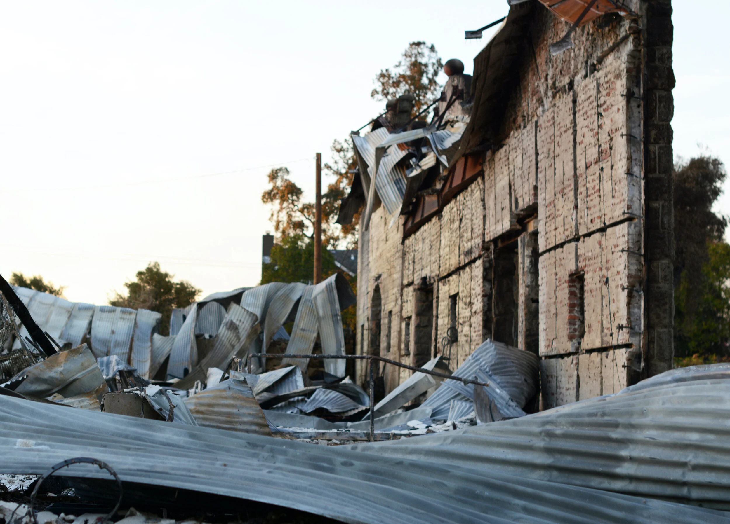 The Kincade fire destroyed the 150-year-old cellar of Soda Rock Winery in Healdsburg, Sonoma County. With the community’s help, the owners have begun to rebuild. Photo by Eric Fang