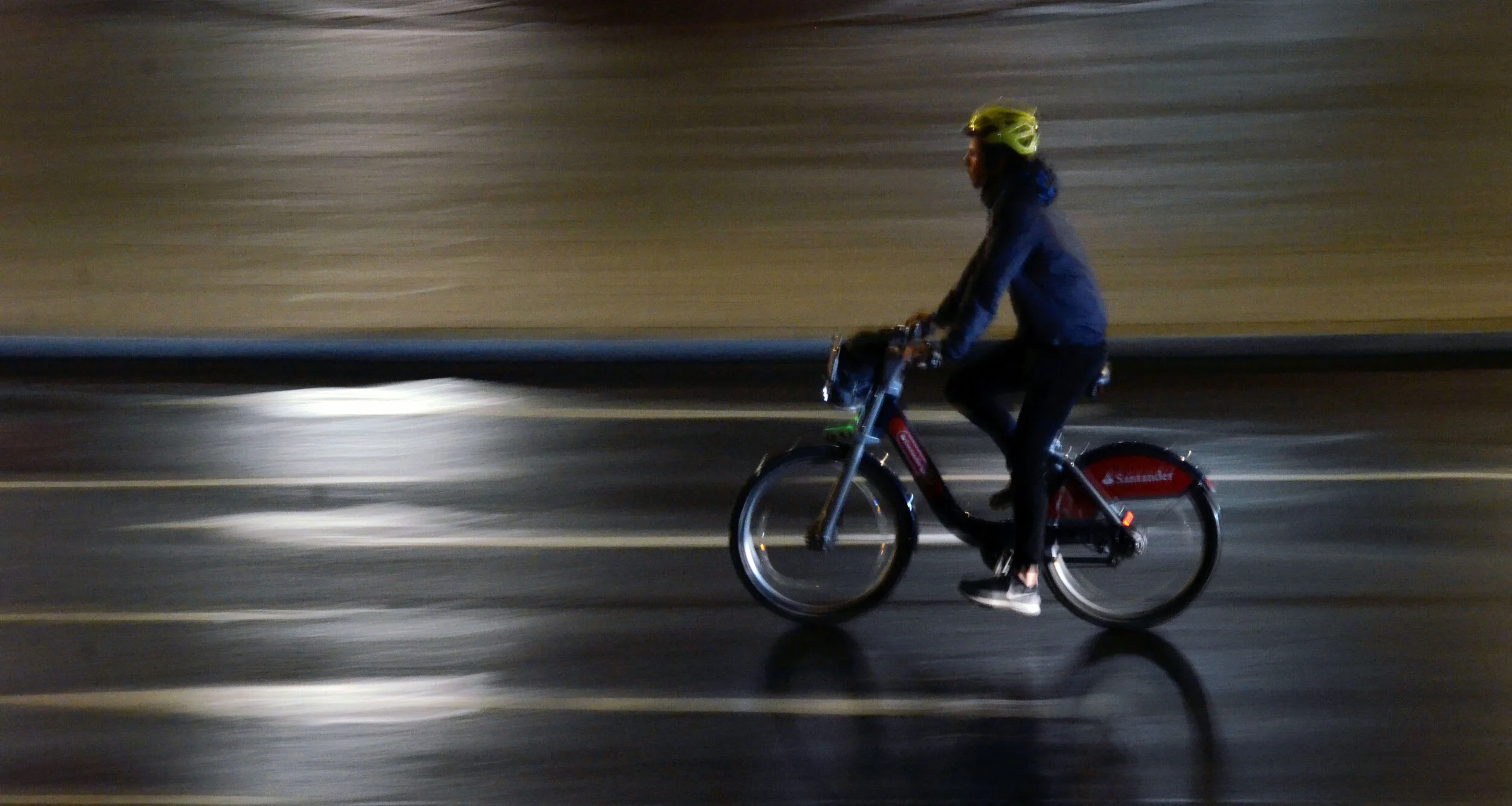A lone bicyclist rides down a road near Trafalgar Square on June 10, 2019.&nbsp;