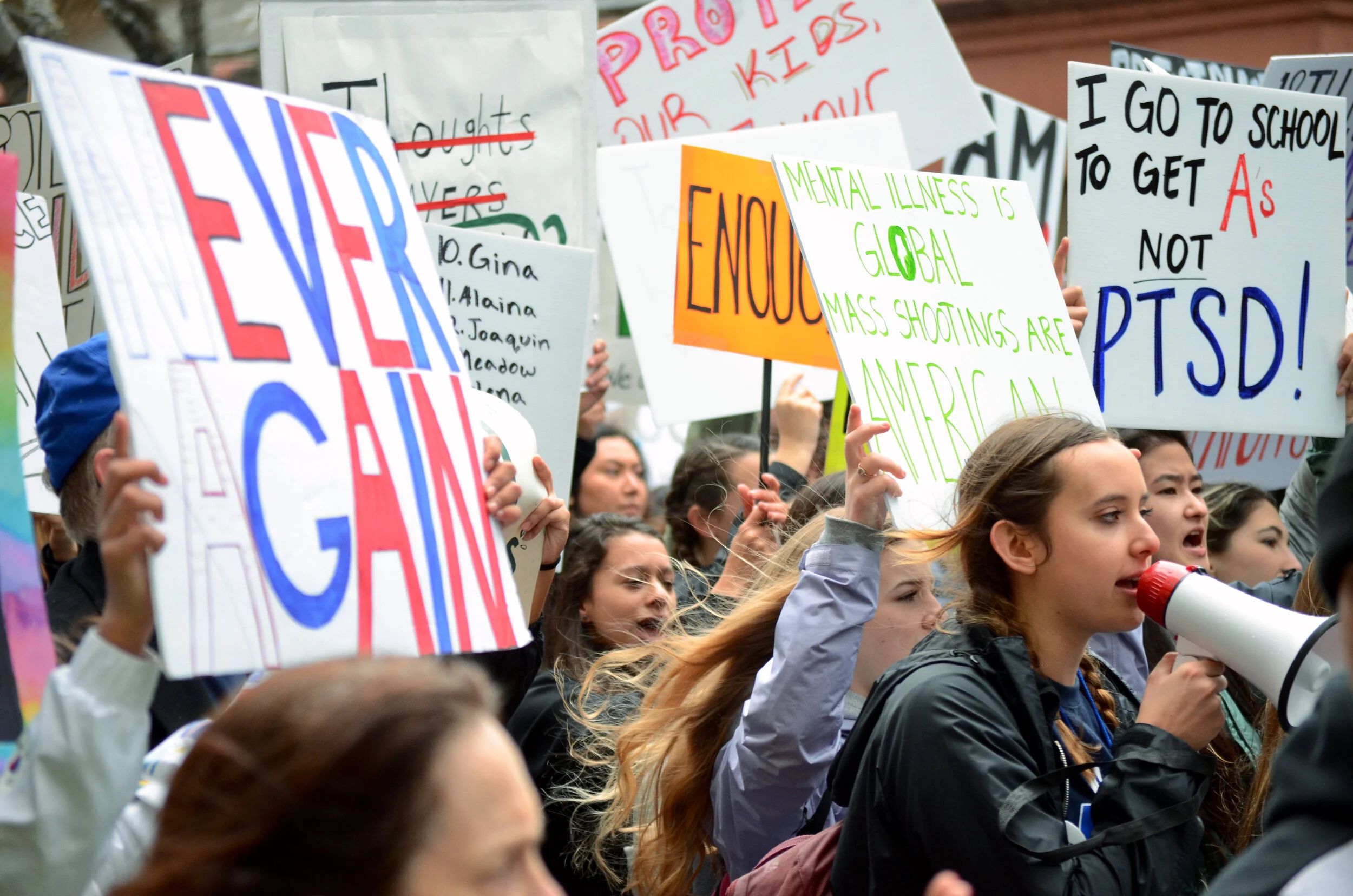 Students hold up signs advocating for gun legislation reform during the San Jose March for Our Lives protest. In the Bay Area, marches were held in San Jose, San Francisco and Oakland, among other cities. Photo by Eric Fang