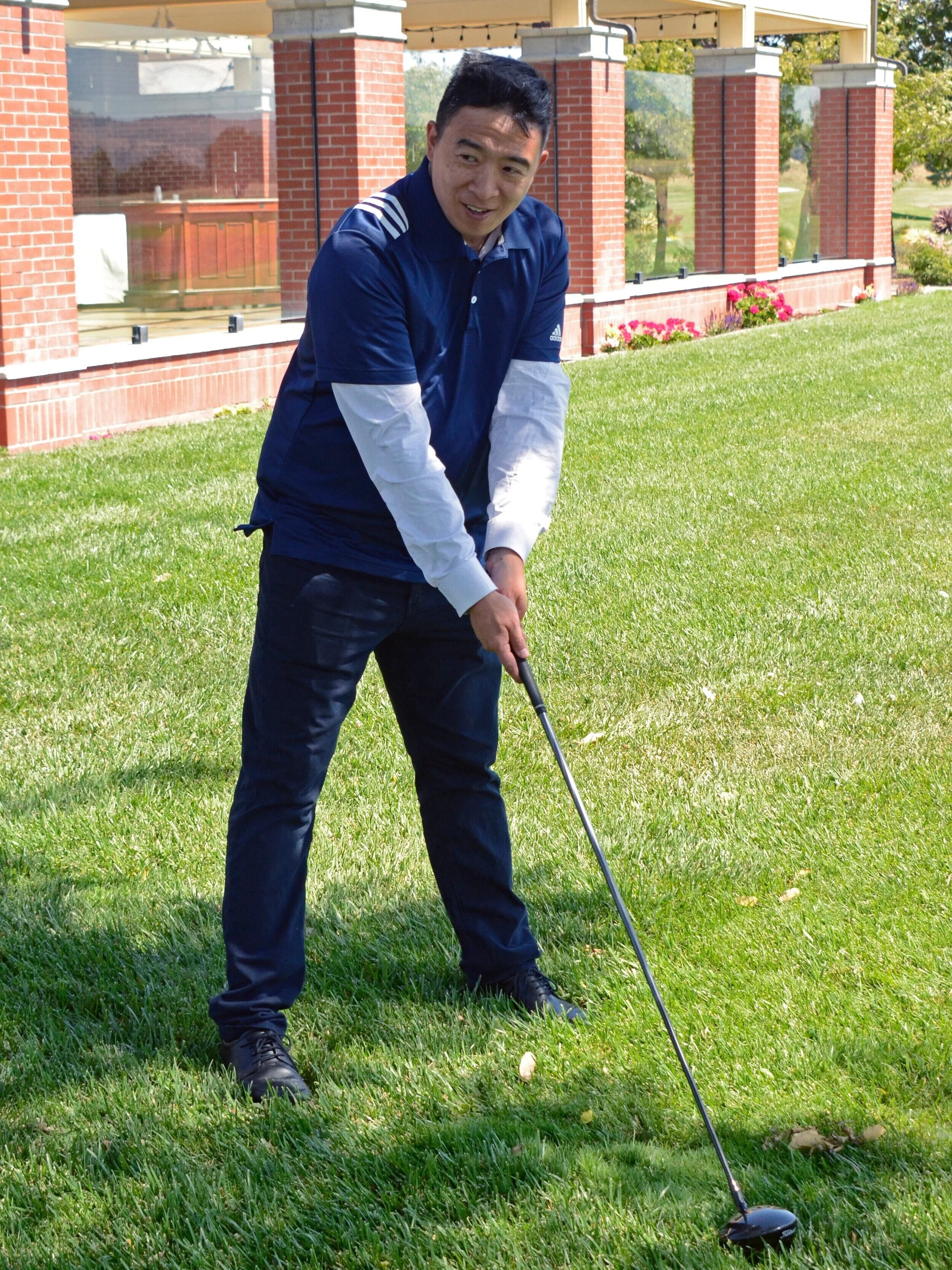 Democratic presidential hopeful Andrew Yang prepares to putt a golfball during his Morgan Hill fundraiser on Aug. 21, 2019. Yang spoke to and ate lunch with a crowd of over 150 people after holding a golf tournament to raise money for his campaign. …