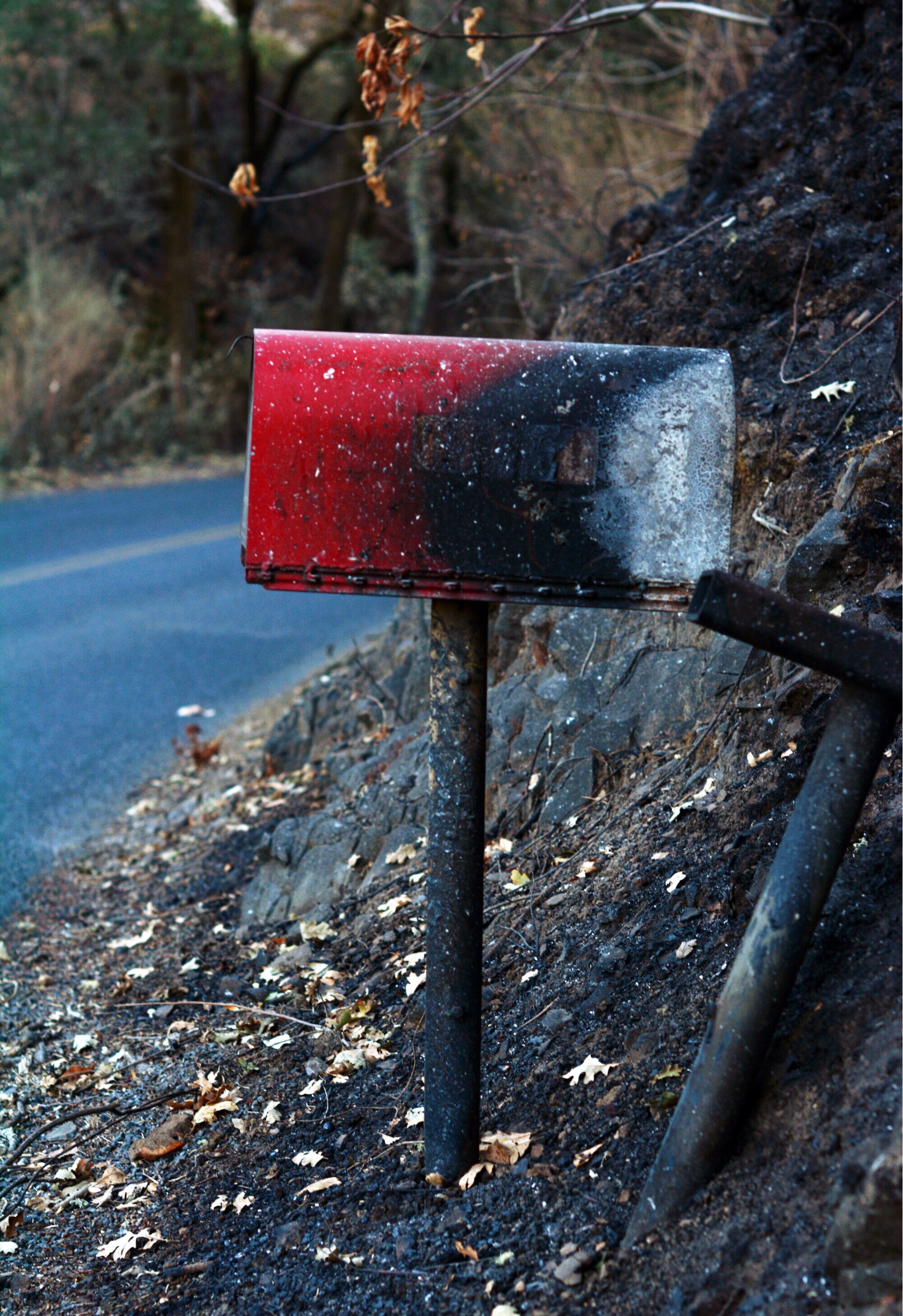 A mailbox on Chalk Hill Road bears the Kincade fire’s mark. After firefighters fully contained the fire on Nov. 3, Cal Fire lifted all evacuation orders. Photo by Eric Fang