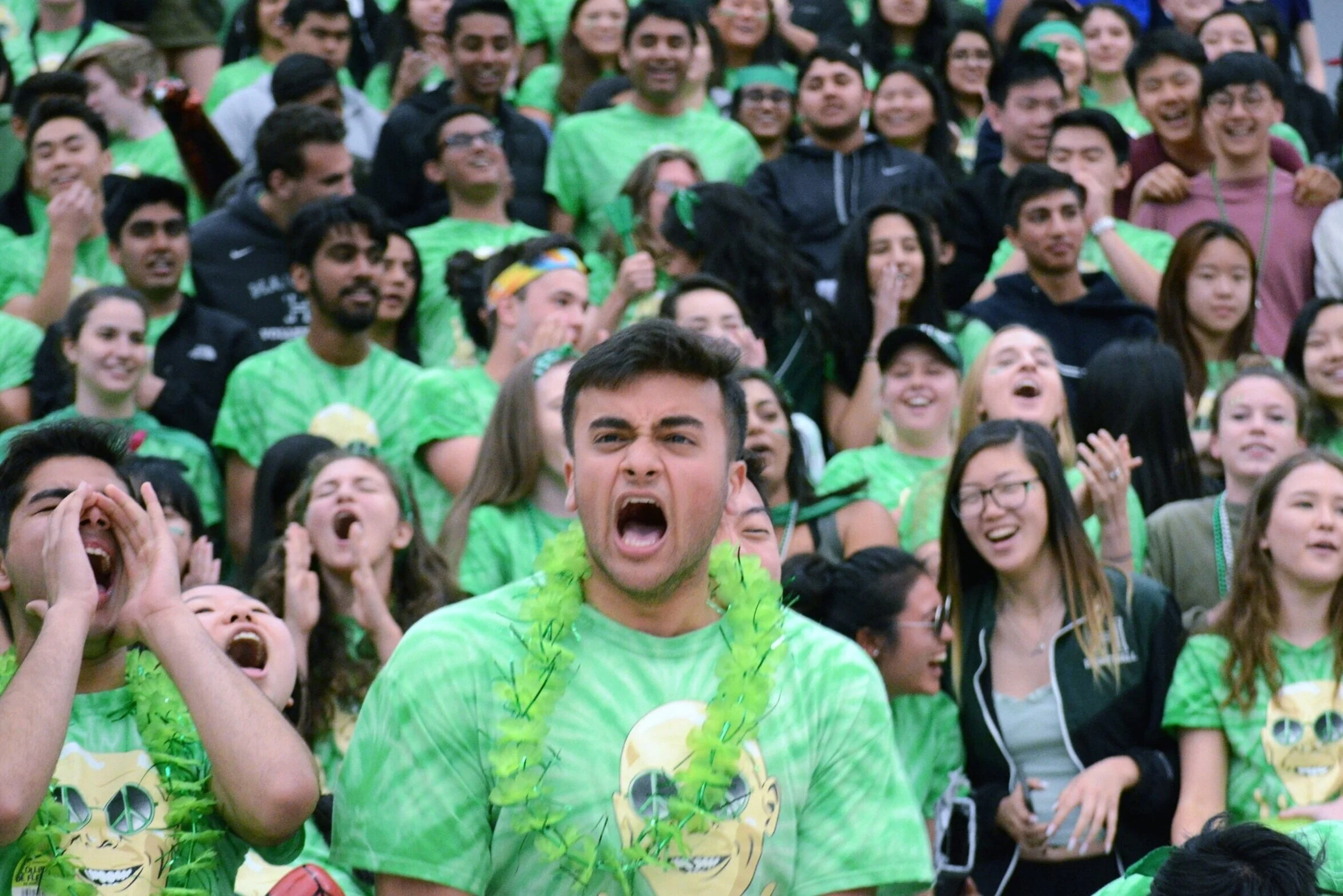 A senior yells to encourage classmates participating in spirit competitions. The senior class is led by their class dean, Victor Adler. Photo by Eric Fang