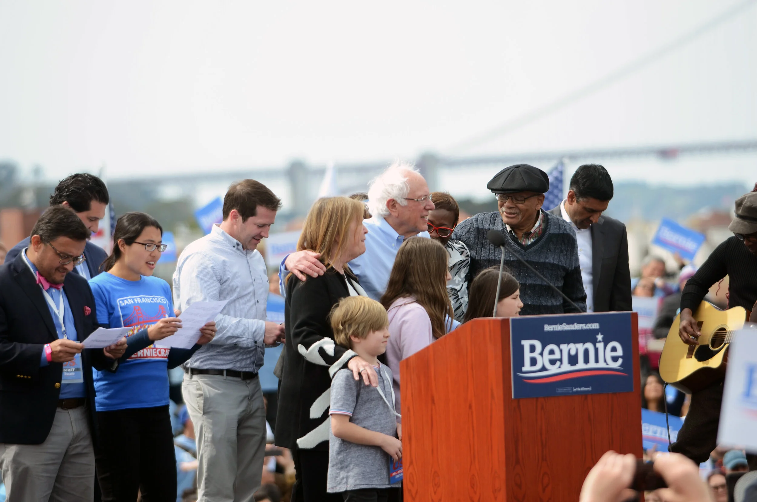 Sanders stands on stage with members of his family and local activists following his rally in San Francisco on March 24, 2019. Sanders’ family tossed T-shirts to audience members close to the stage. Photo by Eric Fang