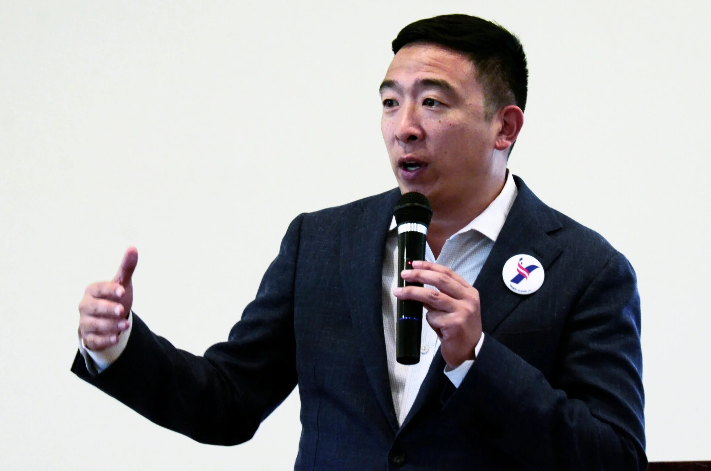 Democratic presidential candidate Andrew Yang speaks to supporters at a golf fundraiser in Morgan Hill on Aug. 21. In his speech, Yang called himself “the opposite of Trump: an Asian man who likes math.” Photo by Eric Fang