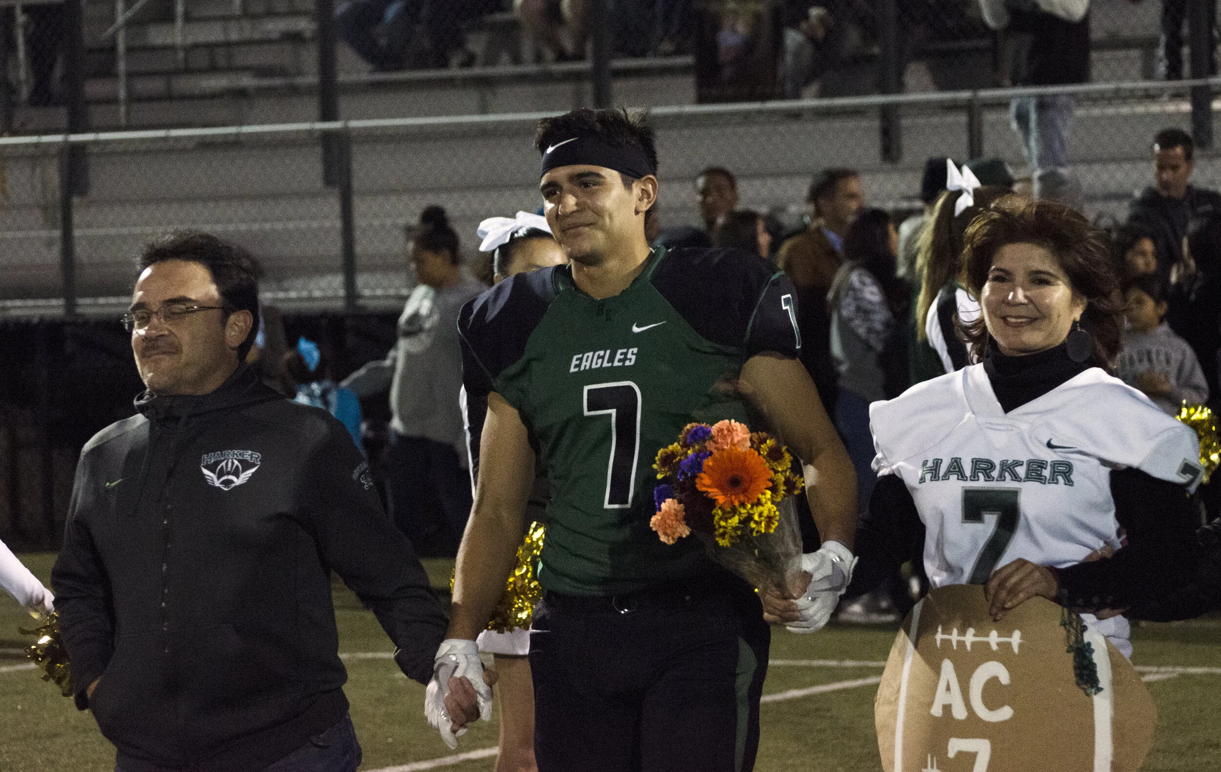 Harker honors one of the football team’s varsity receivers during the annual senior night celebrations on Oct. 23, 2017. The football team faced off against Lindhurst High School during their 2017-2018 senior night. Photo by Eric Fang