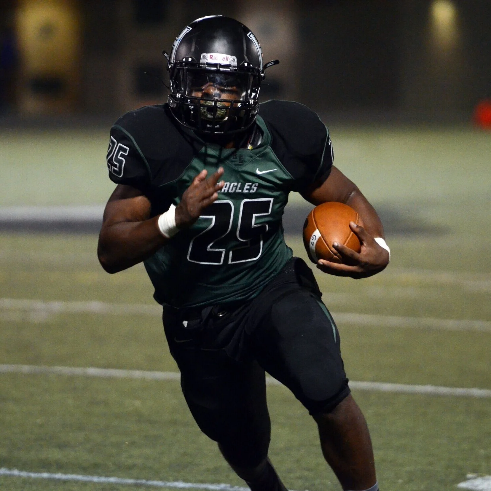 A Harker running back rushes for the opposing end zone during a game against Tamalpais High School on Oct. 6, 2017. The varsity football team ended their 2017-2018 season with an 11-1 record. Photo by Eric Fang