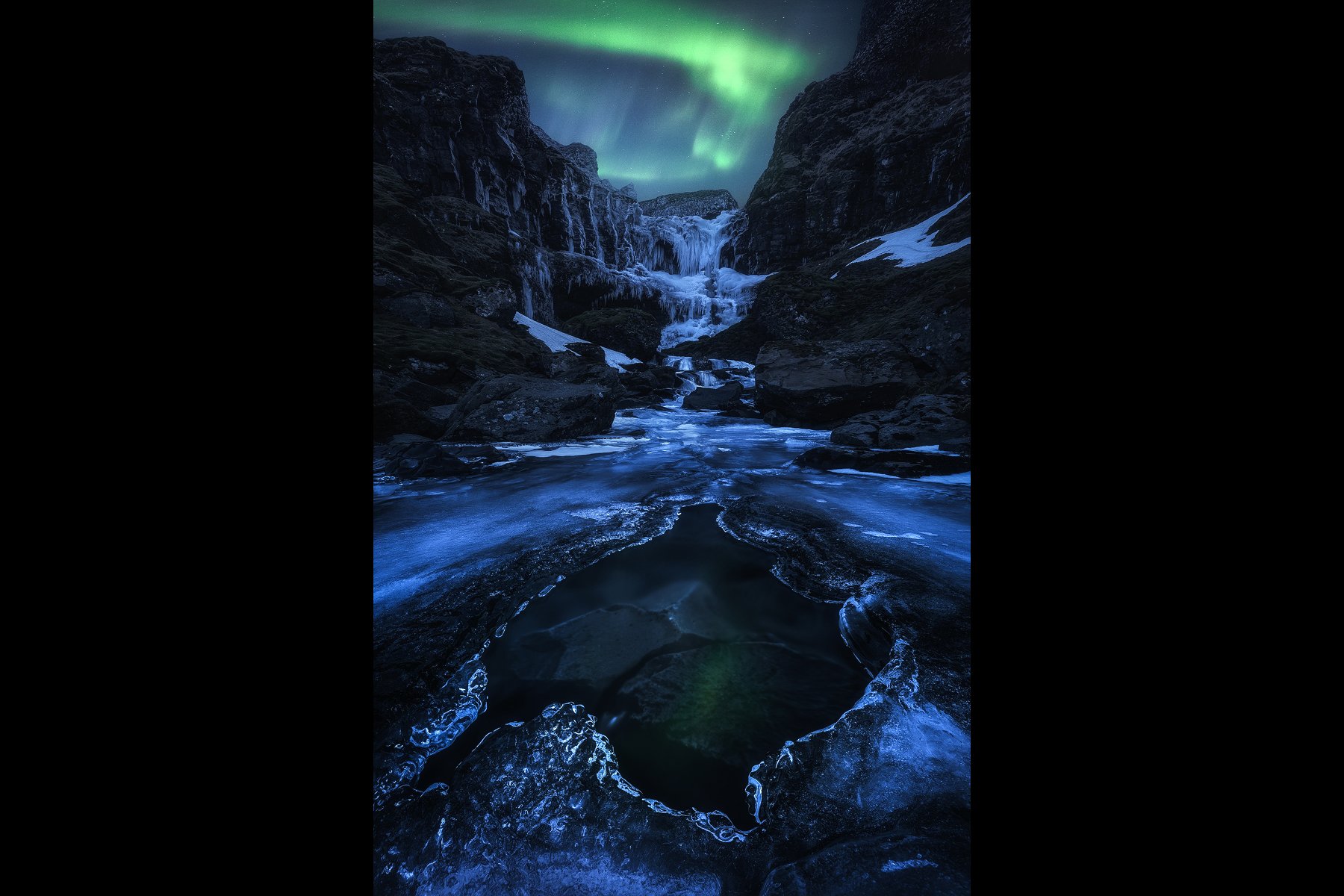 Iceland-Frozen-Waterfall-Aurora-Banner.jpg