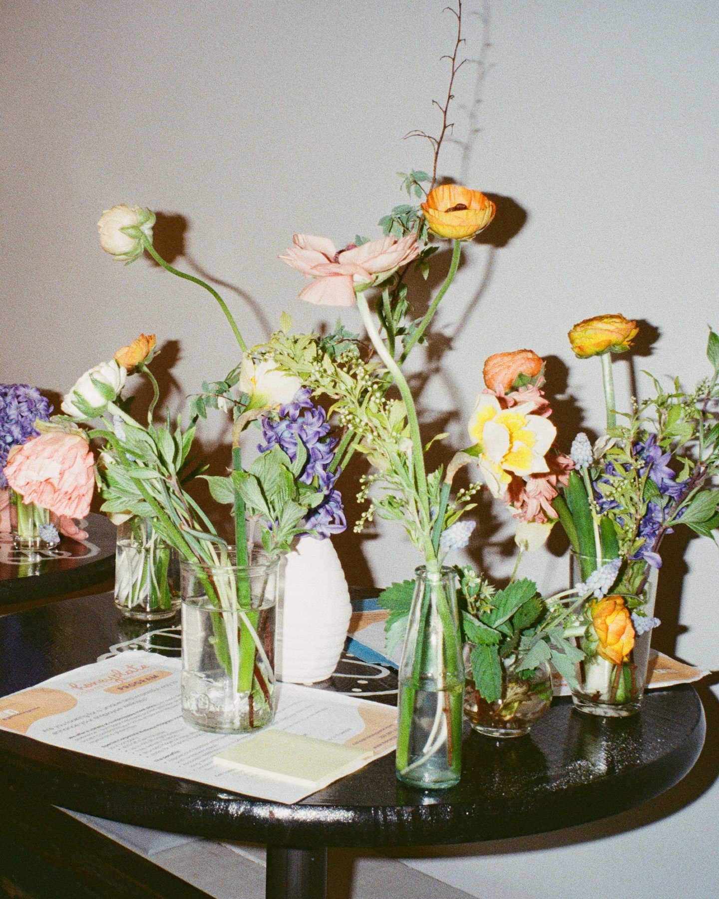 Spring on film &ndash; soft petals, scrappy signs, shared plates, snapshots.