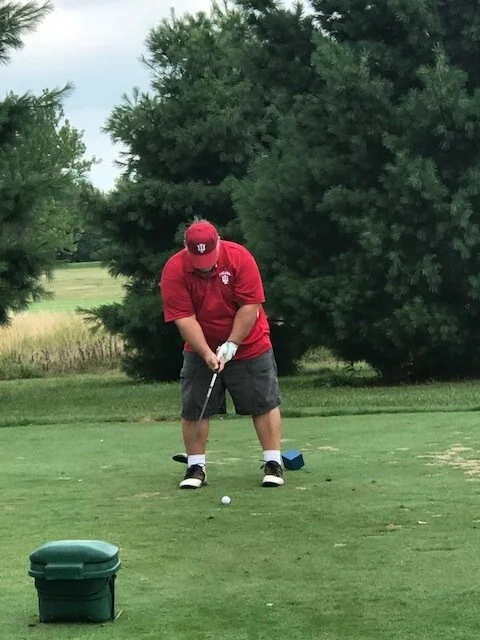 Stan Surfus tees up a shot at the golf outing hosted to benefit Northeastern Indiana CASA.