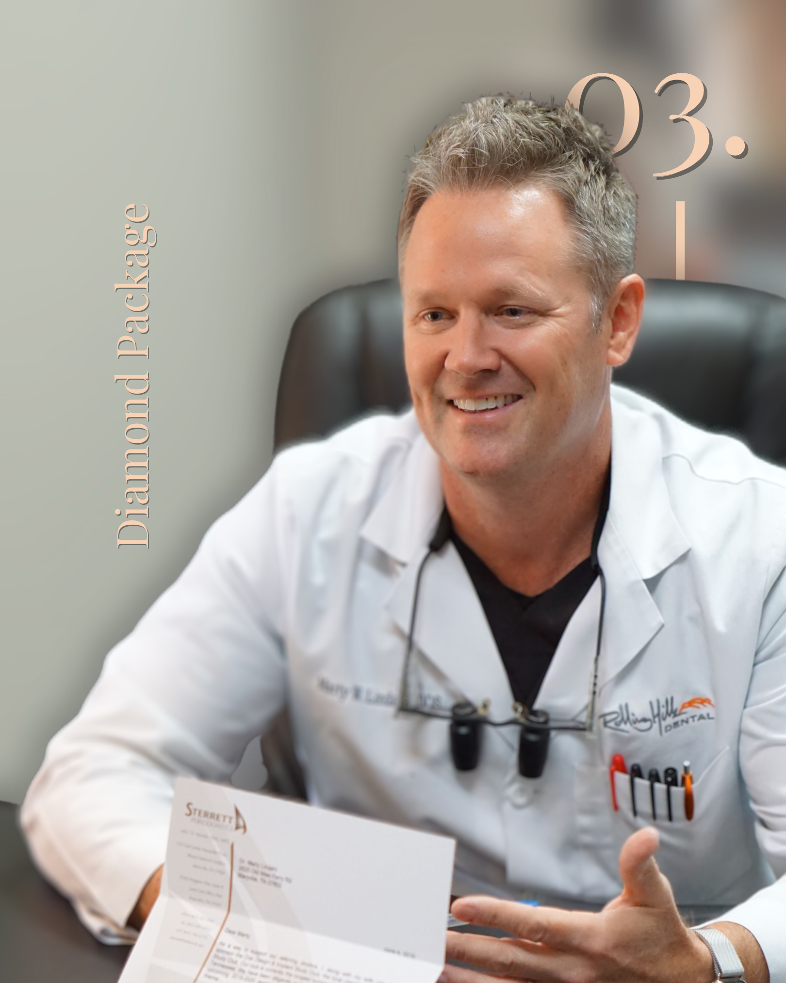 A smiling man in a white lab coat sitting at a desk, holding a letter from Sterrett, with a pair of dental loupes hanging around his neck, in an office setting.