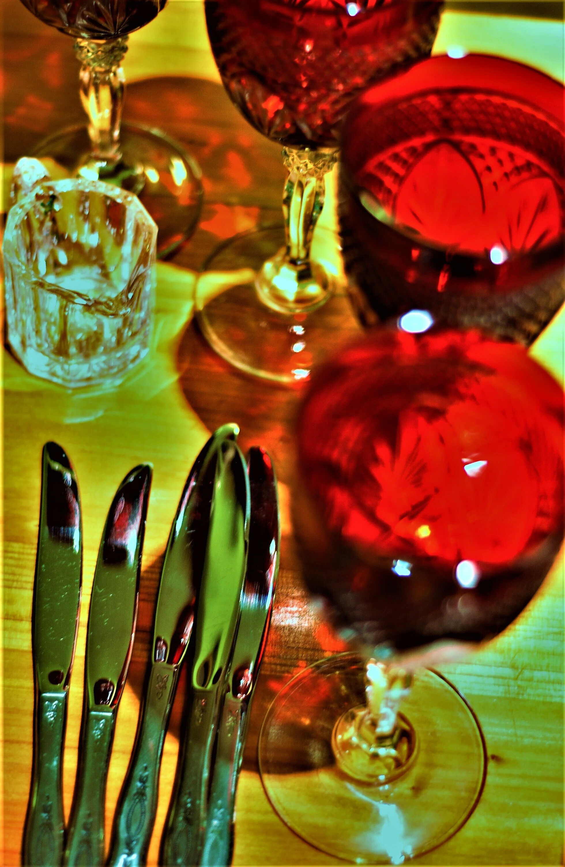  Stemmed glasses and silverware ready for a holiday meal. 